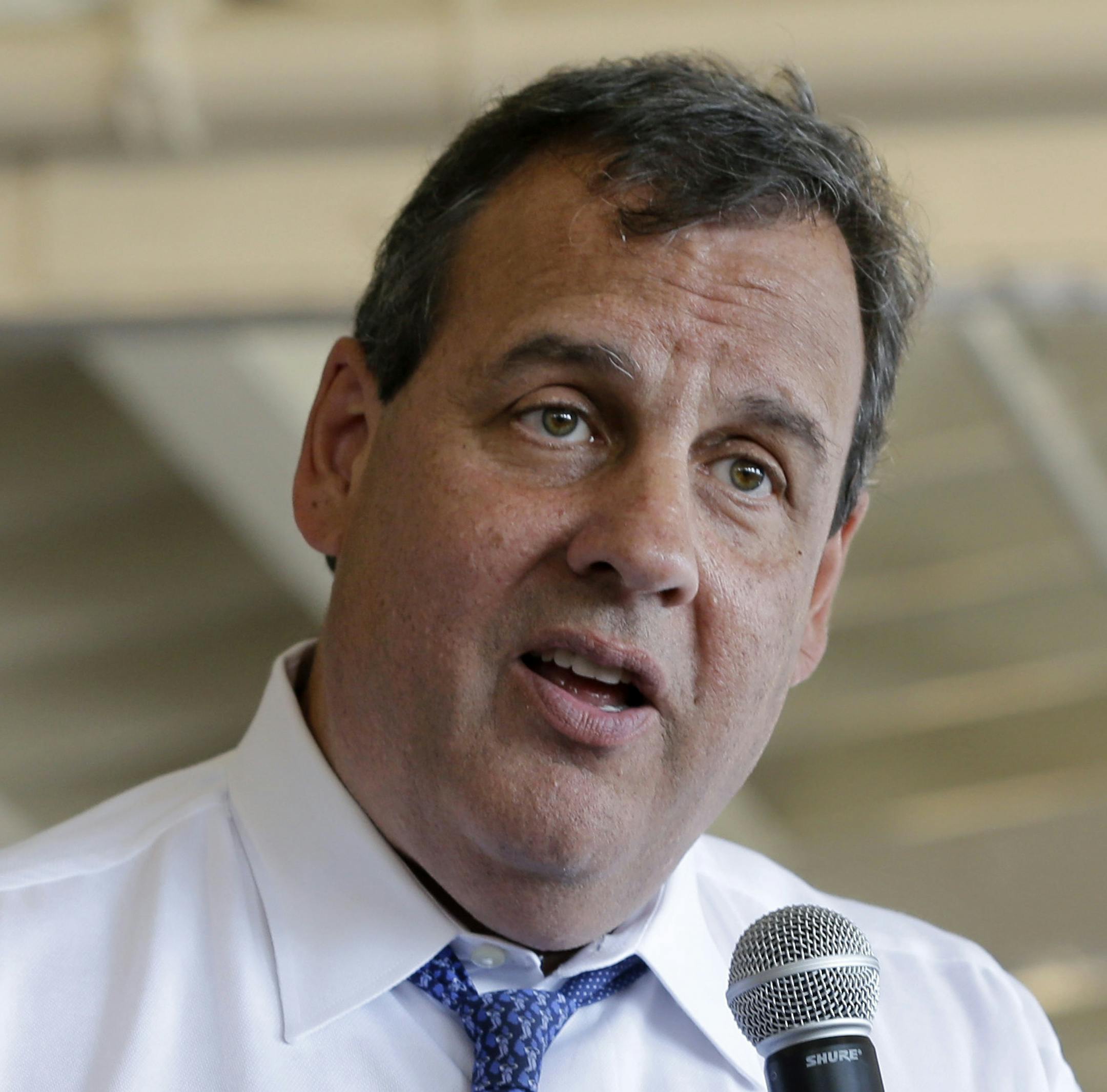 New Jersey Gov. Chris Christie addresses a gathering during a town hall meeting Thursday, Aug. 14, 2014, in Ocean City, N.J. (AP Photo/Mel Evans)