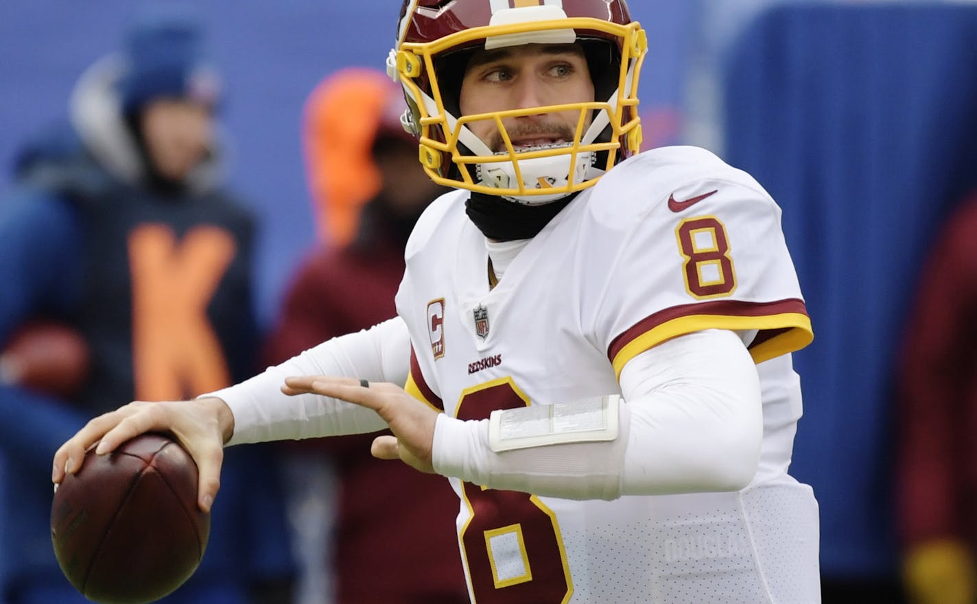 FILE - In this Dec. 31, 2017, file photo, Washington Redskins quarterback Kirk Cousins (8) throws a pass during the first half of an NFL football game against the New York Giants, in East Rutherford, N.J. The NFL's offseason features plenty of intrigue beyond where Kirk Cousins and dozens of other quarterbacks will land. (AP Photo/Bill Kostroun, File)