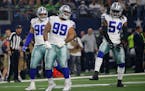 Dallas Cowboys defensive tackle Antwaun Woods (99) celebrates the defense's stoping of the Seattle Seahawks during the first half of the NFC wild-card