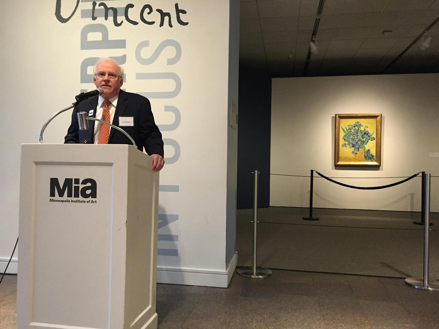 Patrick Noon reveals Van Gogh's 1890 painting "Irises, Saint-Rémy-de Provence" on Friday, August 21, 2015 at the Minneapolis Institute of Art.