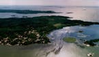 August 20, 1993 Aerial view - 14,000 islands in Lake of the Woods, 'we' think this is Oak Island, on which a third of the counties resorts are located