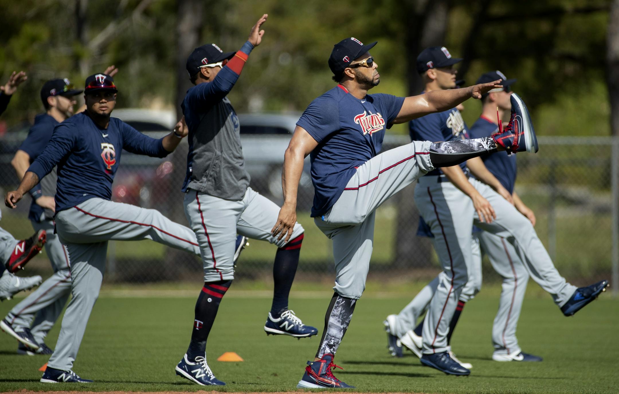Minnesota Twins DH Nelson Cruz and teammates stretched during practice on Tuesday.