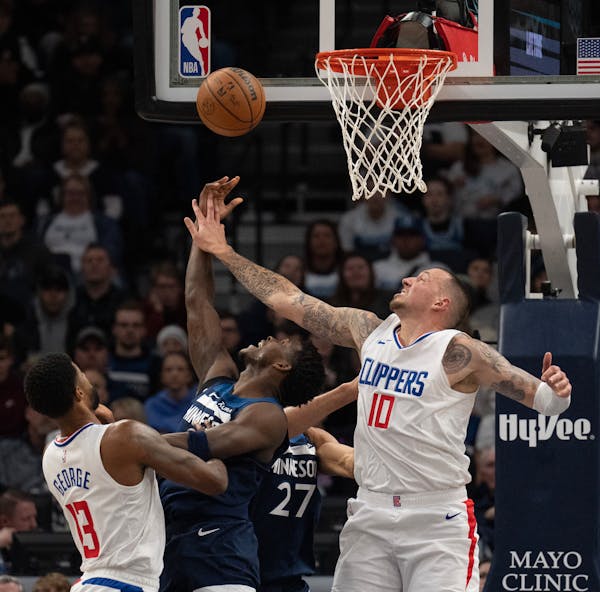 Minnesota Timberwolves guard Anthony Edwards (5) dropped a shot in over LA Clippers center Daniel Theis (10) in the second quarter. The Minnesota Timb