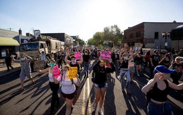 Protest continued on Grand Avenue after leaving the Minnesota governor's mansion in St. Paul on June 1.