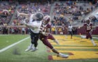 Minnesota's linebacker Kamal Martin interfered with a a pass intended for Northwestern's wide receiver Trey Pugh in the end zone during the first quar