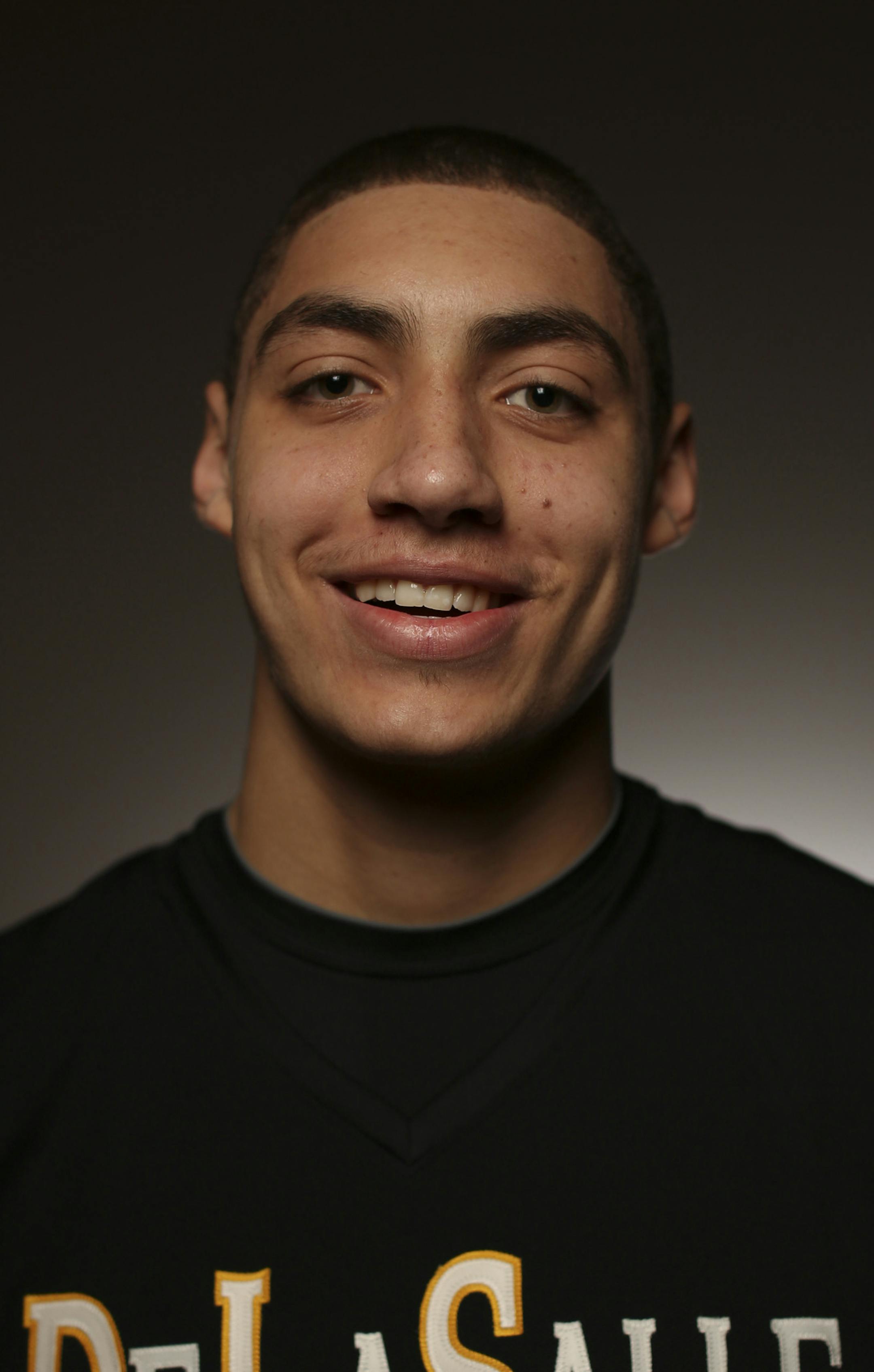 The Star Tribune's All-Metro Boy's Basketball Team gathered in the studio Sunday afternoon, March 17, 2013 for a portrait. Reid Travis of DeLaSalle. ] JEFF WHEELER ‚Ä¢ jeff.wheeler@startribune.com ORG XMIT: MIN1303181038321218
