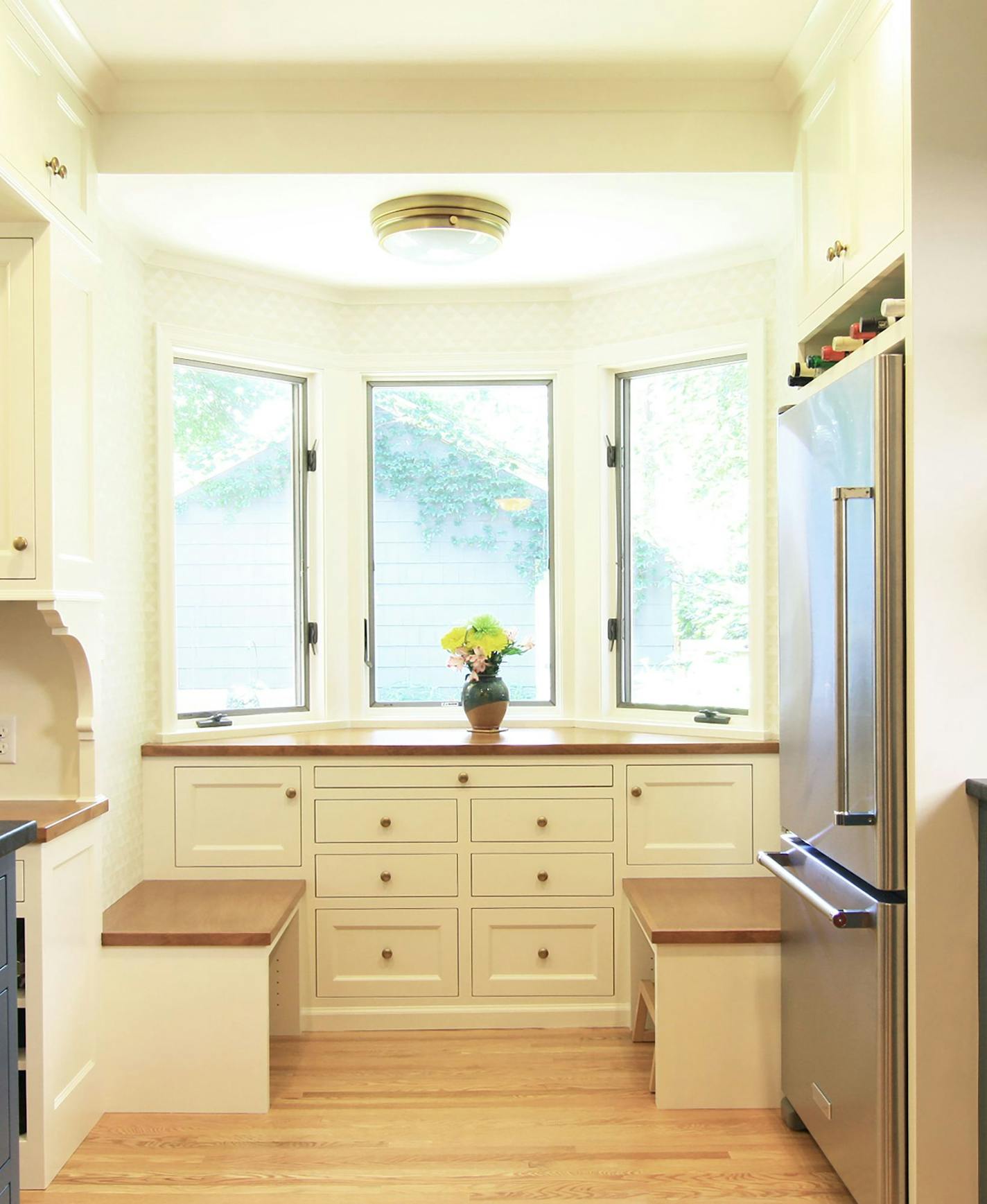 Everyday Solutions. A modest kitchen remodel creates an entry mudroom that doubles as a breakfast nook by K Nelson Architects.