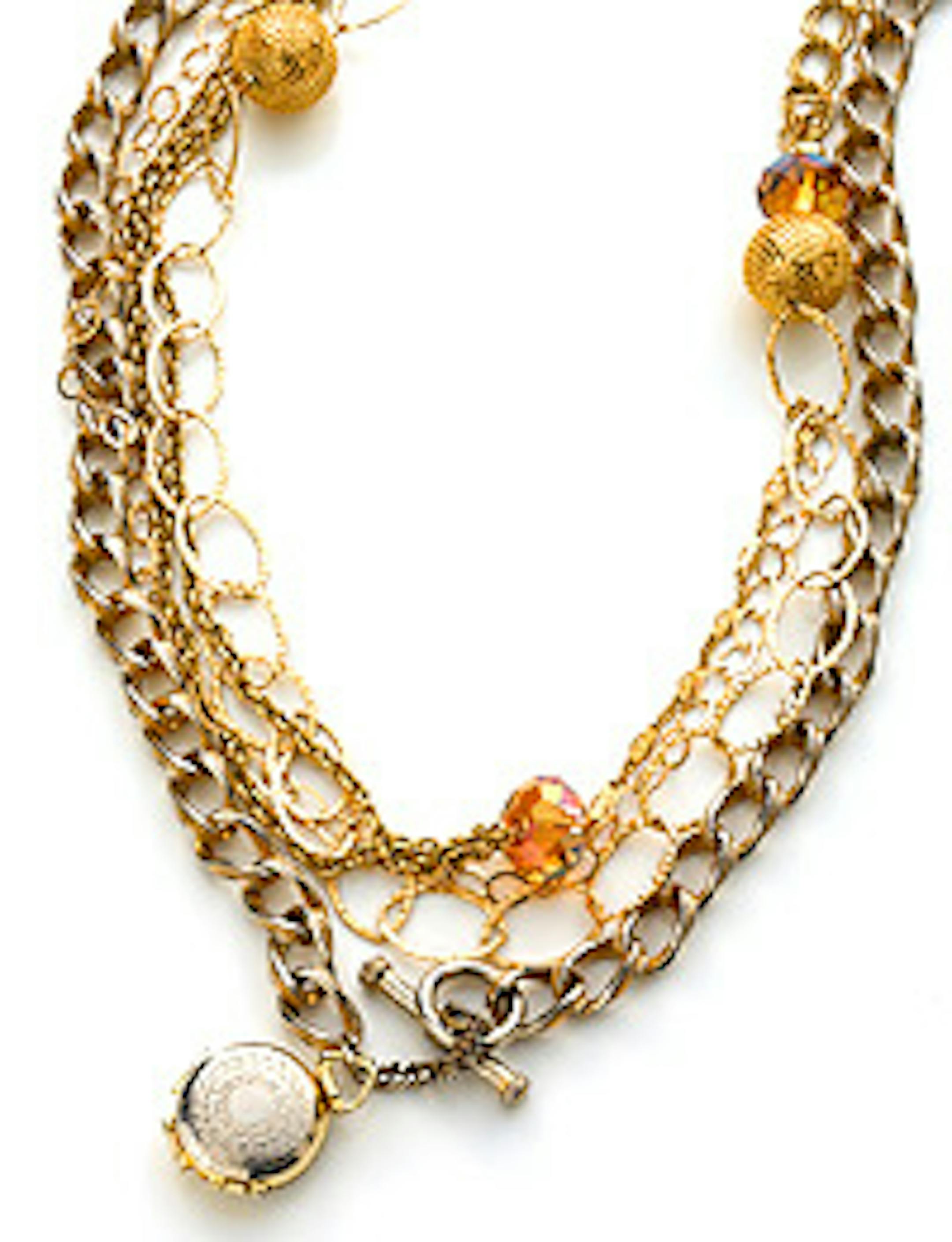 Jewelry by Natalie Lucas.