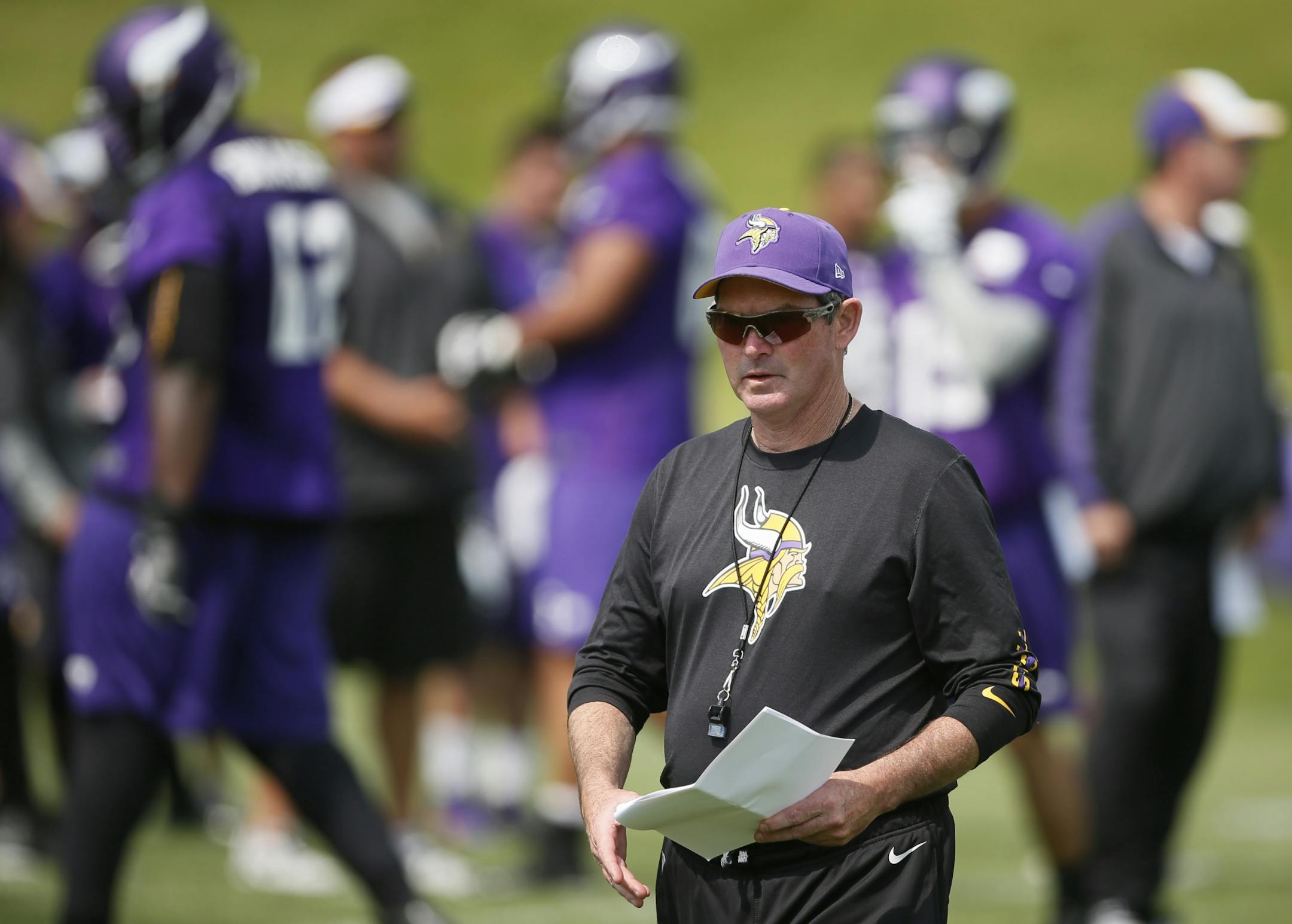 Head coach Mike Zimmer watched his the Minnesota Vikings during OTA practice at Winter Park Wednesday June 11, 2014 in Eden Prairie,MN.