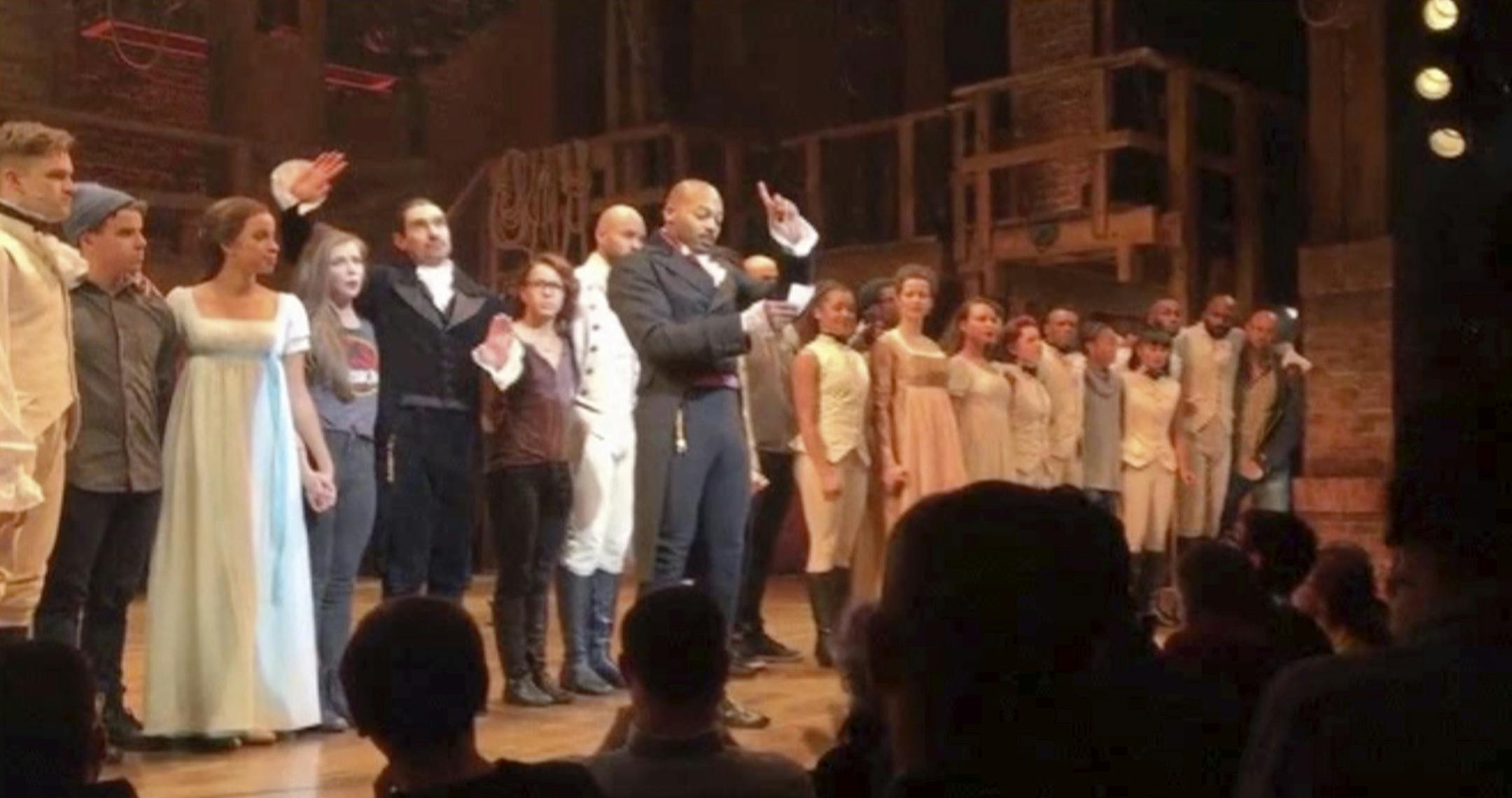 In this image made from a video provided by Hamilton LLC, actor Brandon Victor Dixon who plays Aaron Burr, the nationís third vice president, in "Hamilton" speaks from the stage after the curtain call in New York, Friday, Nov. 18, 2016. Vice President-elect Mike Pence is the latest celebrity to attend the Broadway hit "Hamilton," but the first to get a sharp message from a cast member from the stage. (Hamilton LLC via AP) ORG XMIT: MIN2016111908323701