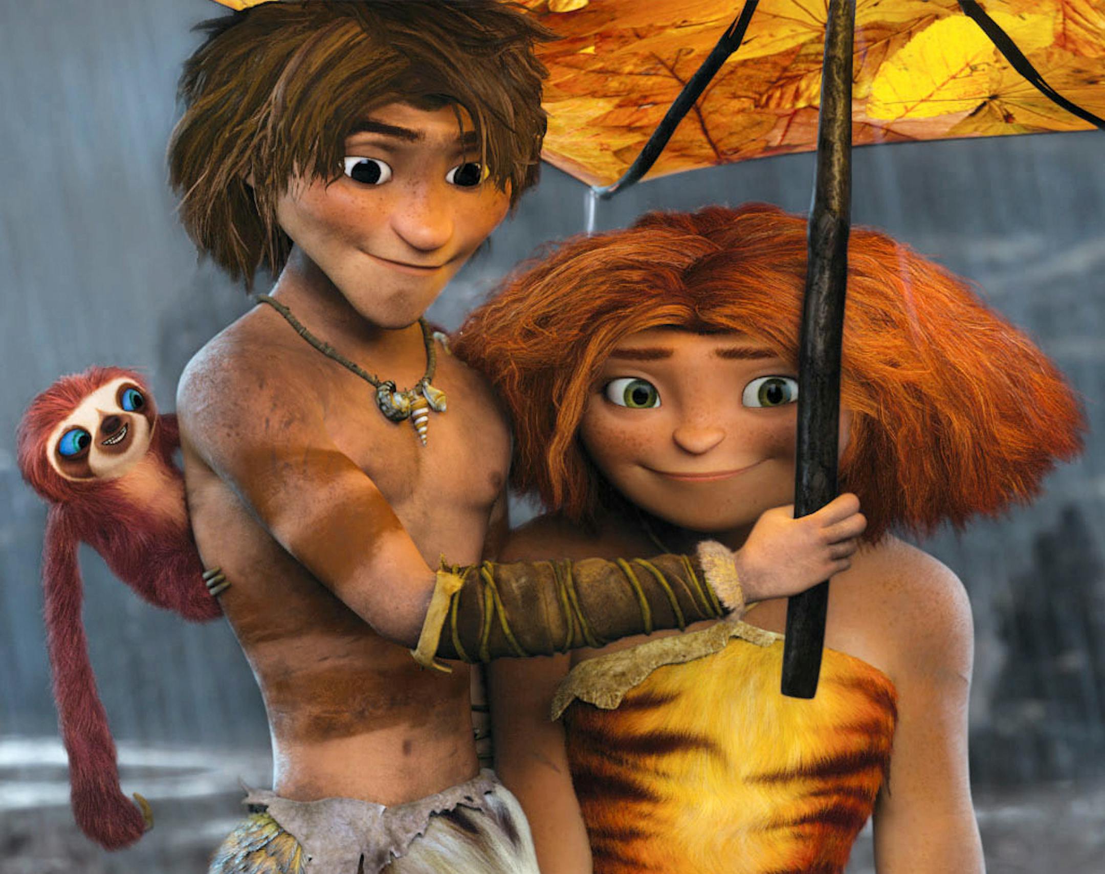 This film publicity image released by DreamWorks Animation shows, from left, Belt the sloth, voiced by Chris Sanders, Guy, voiced by Ryan Reynolds, and Eep, voiced by Emma Stone, in a scene from "The Croods." (AP Photo/DreamWorks Animation) ORG XMIT: NYET209