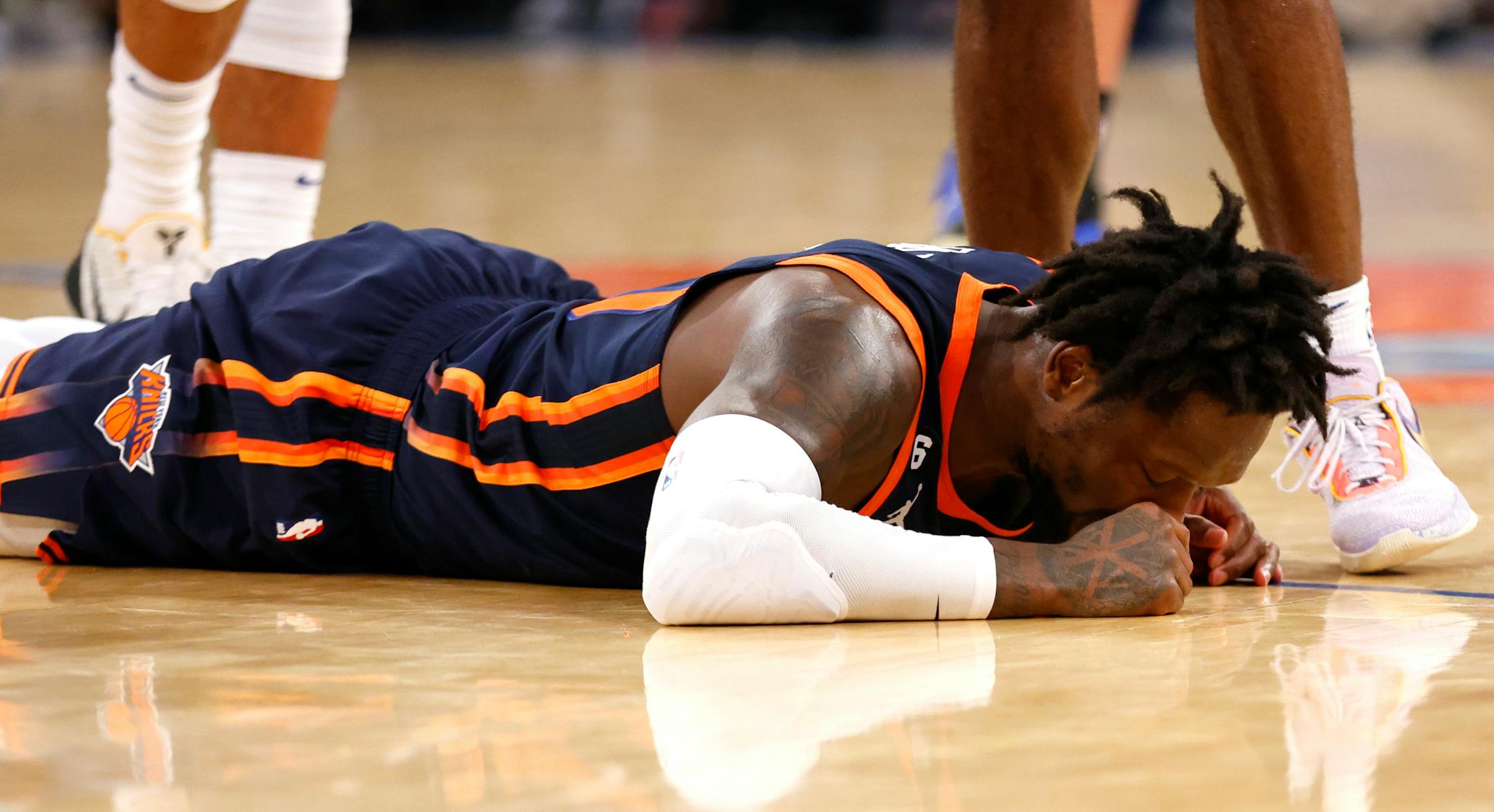 New York Knicks forward Julius Randle (30) reacts after committing a foul against the Minnesota Timberwolves during the second half of an NBA basketball game, Monday, March 20, 2023, in New York. (AP Photo/Noah K. Murray)