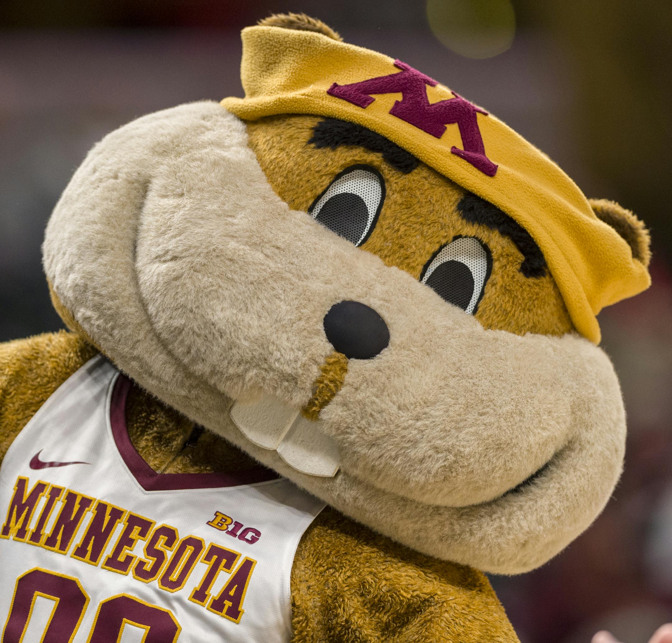 The Minnesota Golden Gophers mascot, Goldy, dances for the fans during a break in the first half of a quarter-final game in the 2018 NCAA Big Ten Womens' Basketball tournament at Bankers Life Fieldhouse in Indianapolis, Friday, March 2, 2018.