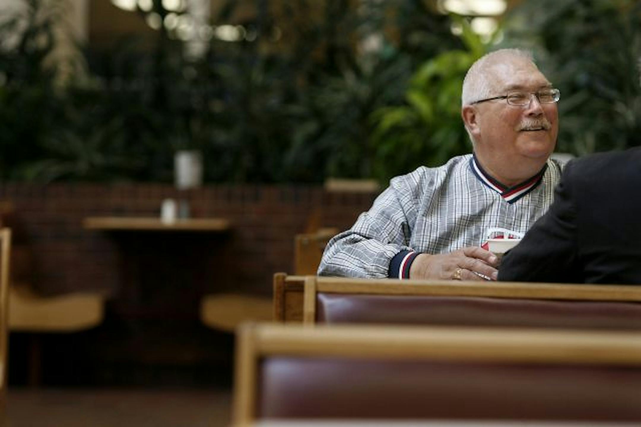 Jim Fiebke spent a year at the base camp at Di An, Vietnam, top. He thought he was healthy until a few years ago, when he developed an insidious form of cancer that has been linked to the defoliant Agent Orange.