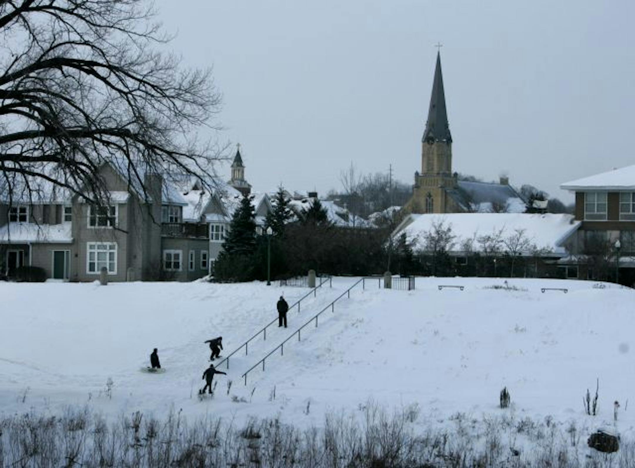 Snowboarders along Chaska's south levee on the Minnesota River.