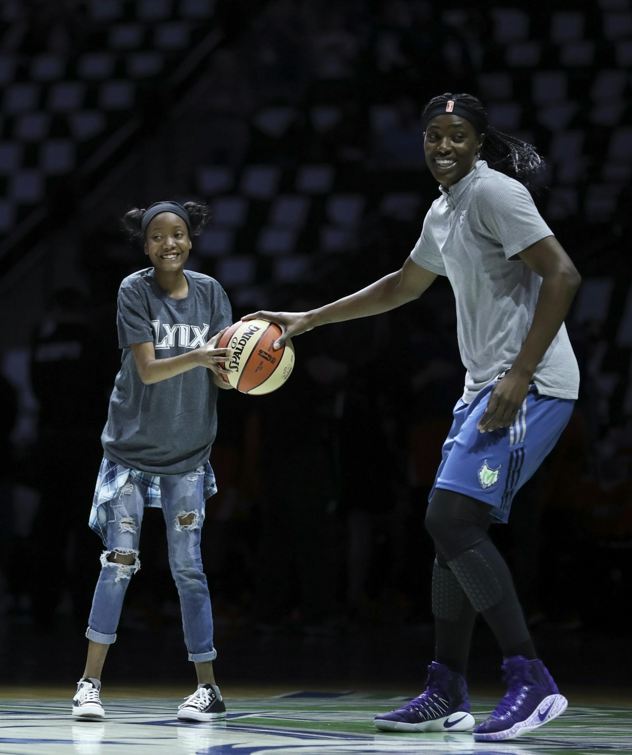 Minnesota Lynx center Sylvia Fowles gave a ball to a young fan after she was introduced before Wednesday night's game.