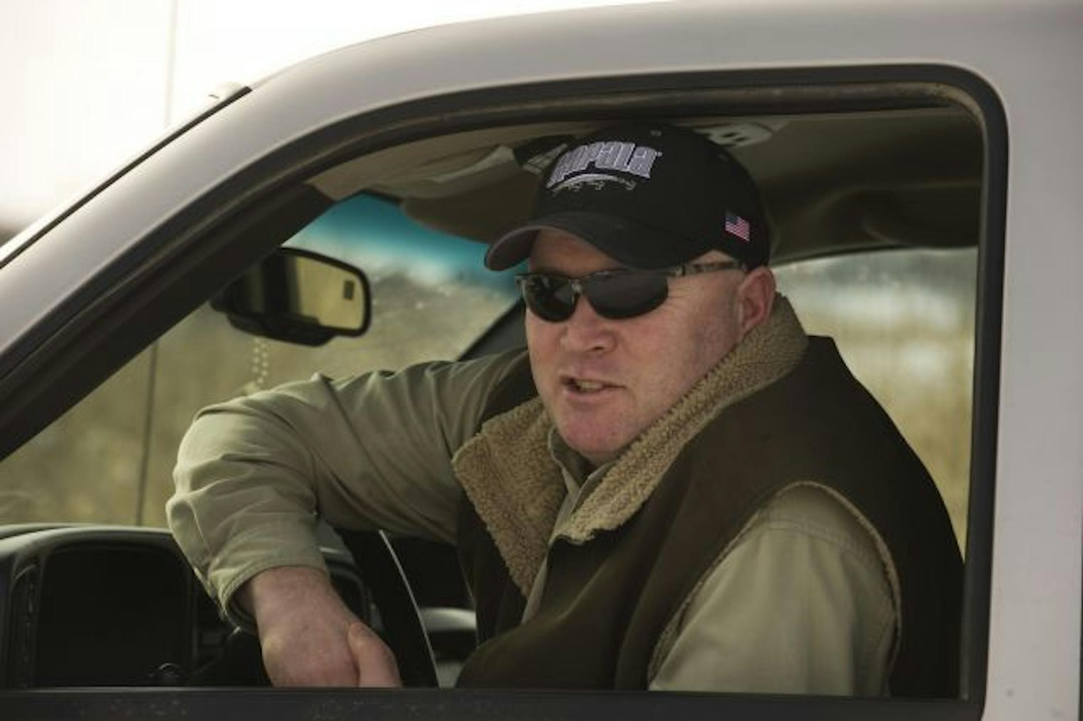 Jeff Traxler stopped between cornfields to check on how things were going with the hunters.