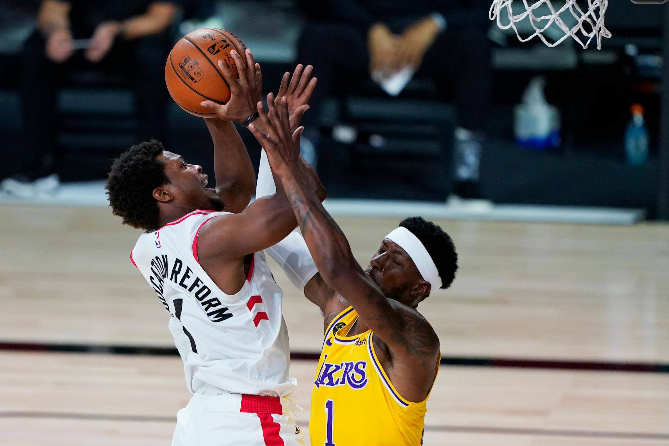 Toronto Raptors' Kyle Lowry shoots over Los Angeles Lakers' Kentavious Caldwell-Pope