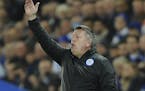 Leicester City's manager Craig Shakespeare gestures to his team during the Champions League round of 16 second leg soccer match between Leicester City