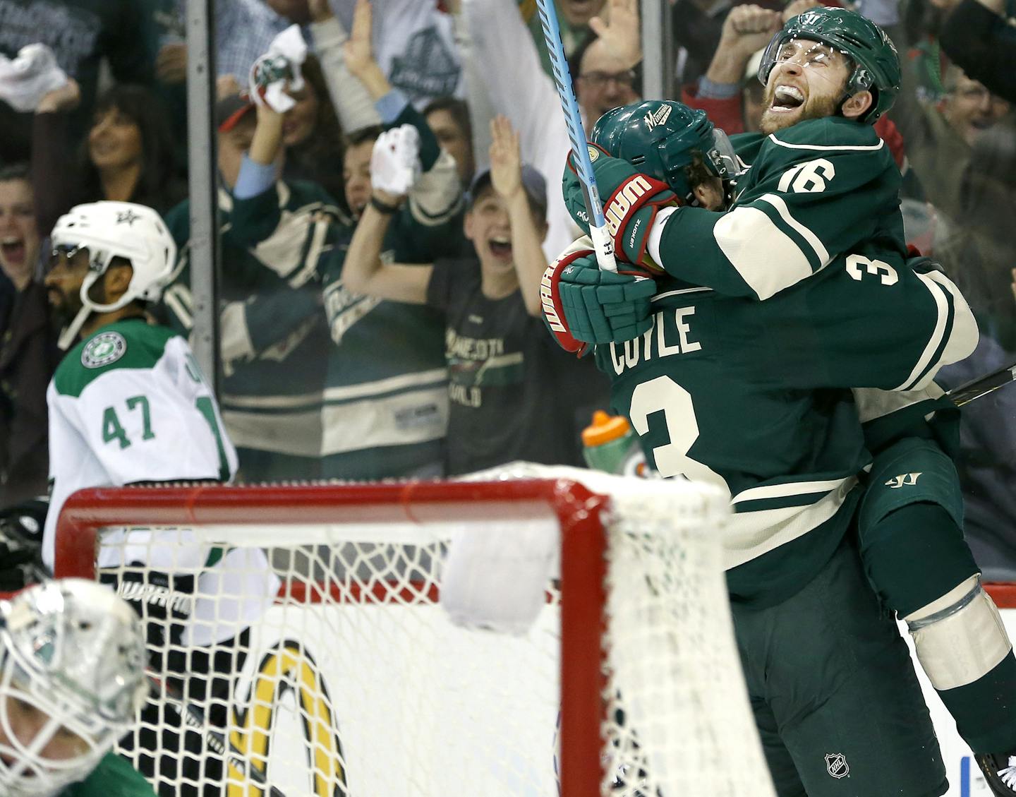 Charlie Coyle (3) and Jason Zucker (16) celebrated after Coyle scored a goal in the second period. ] CARLOS GONZALEZ cgonzalez@startribune.com - April 20, 2016, St. Paul, MN, Xcel Energy Center, NHL, Hockey, Minnesota Wild vs. Dallas Stars, First Round Stanley Cup Playoffs, Game 4