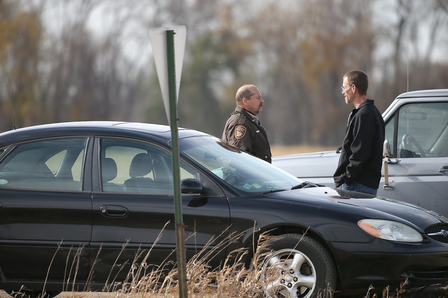 Authorities on Tuesday block the area near the intersection of W. Cemetery Road and English Grove Road, where the body of college student Laura Ann Schwendemann was found, near Villard, Minn.