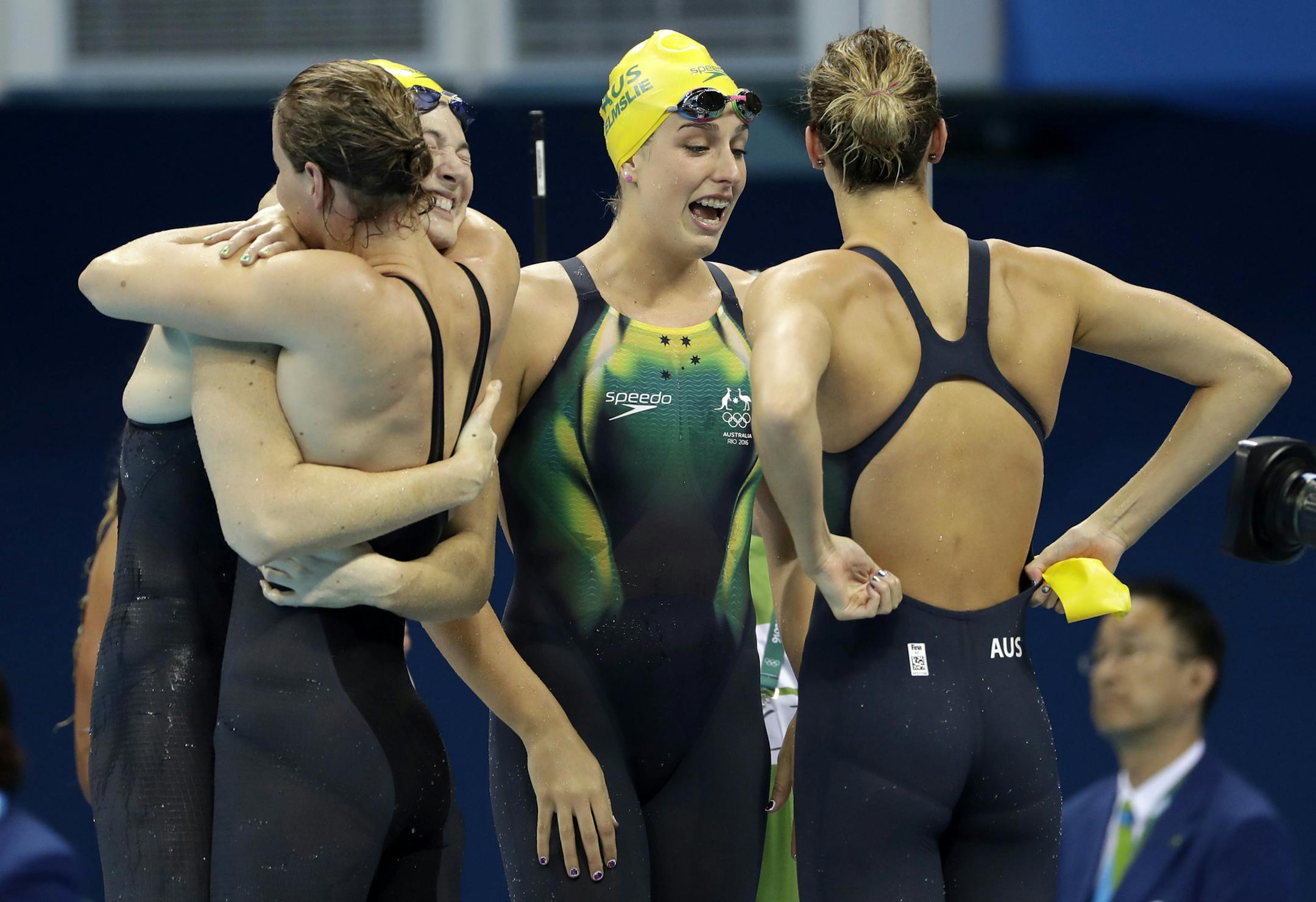Australia's Emma McKeon, Brittany Elmslie, Bronte Campbell and Cate Campbell celebrate winning the gold medal in the women's 4x100-meter freestyle final setting a new world record during the swimming competitions at the 2016 Summer Olympics, Saturday, Aug. 6, 2016, in Rio de Janeiro, Brazil. (AP Photo/Matt Slocum) ORG XMIT: OSWM610