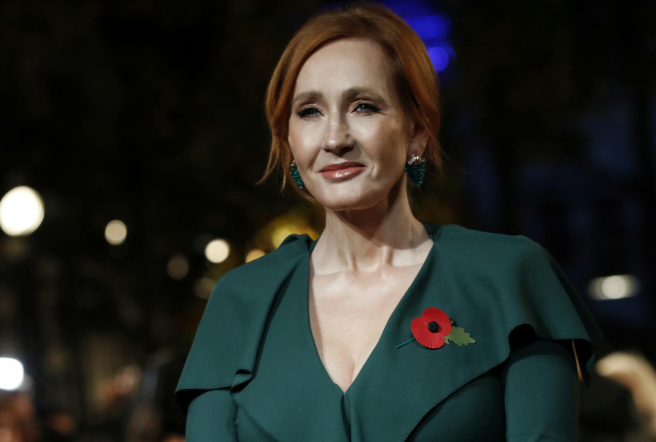 FILE - In this Thursday, Nov. 8, 2018 file photo, writer J.K. Rowling poses for the media at the world premiere of the film "Fantastic Beasts: The Crimes of Grindelwald" in Paris.