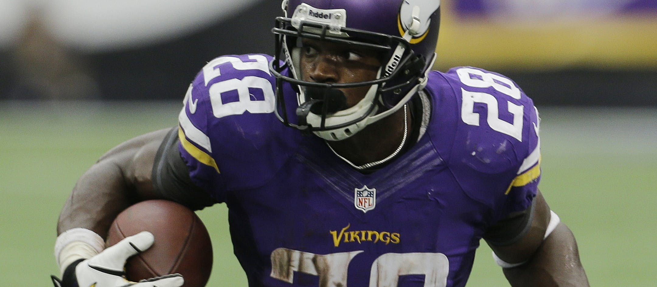 Minnesota Vikings running back Adrian Peterson carries the ball during the second half of an NFL football game against the Cleveland Browns Sunday, Sept. 22, 2013, in Minneapolis. (AP Photo/Ann Heisenfelt)