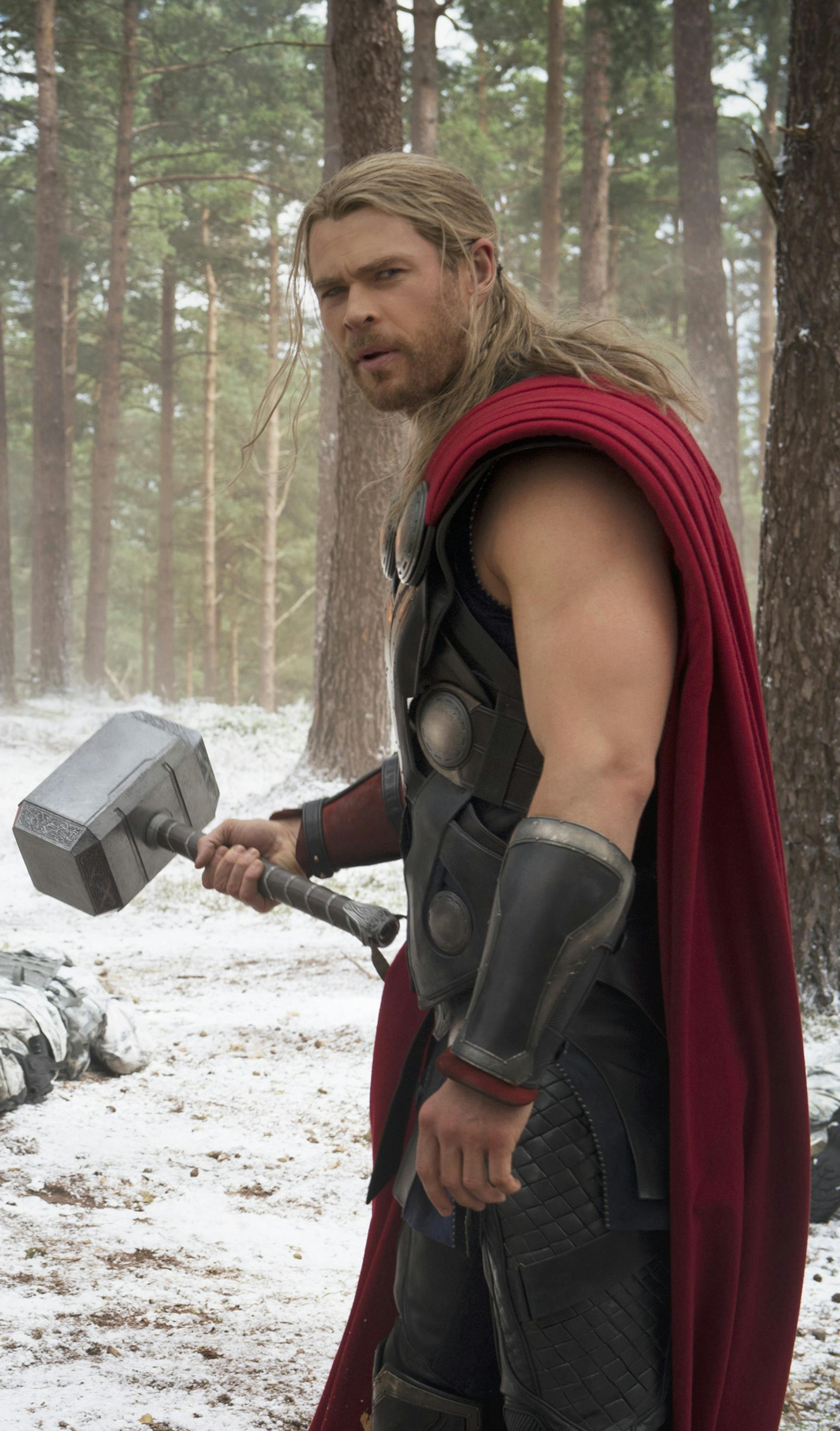 This photo provided by Disney/Marvel shows, Chris Evans, left, as Captain America/Steve Rogers, and Chris Hemsworth as Thor, in a scene of the new film, "Avengers: Age Of Ultron." The movie releases in the U.S. on May 1, 2015. (Jay Maidment/Disney/Marvel via AP)