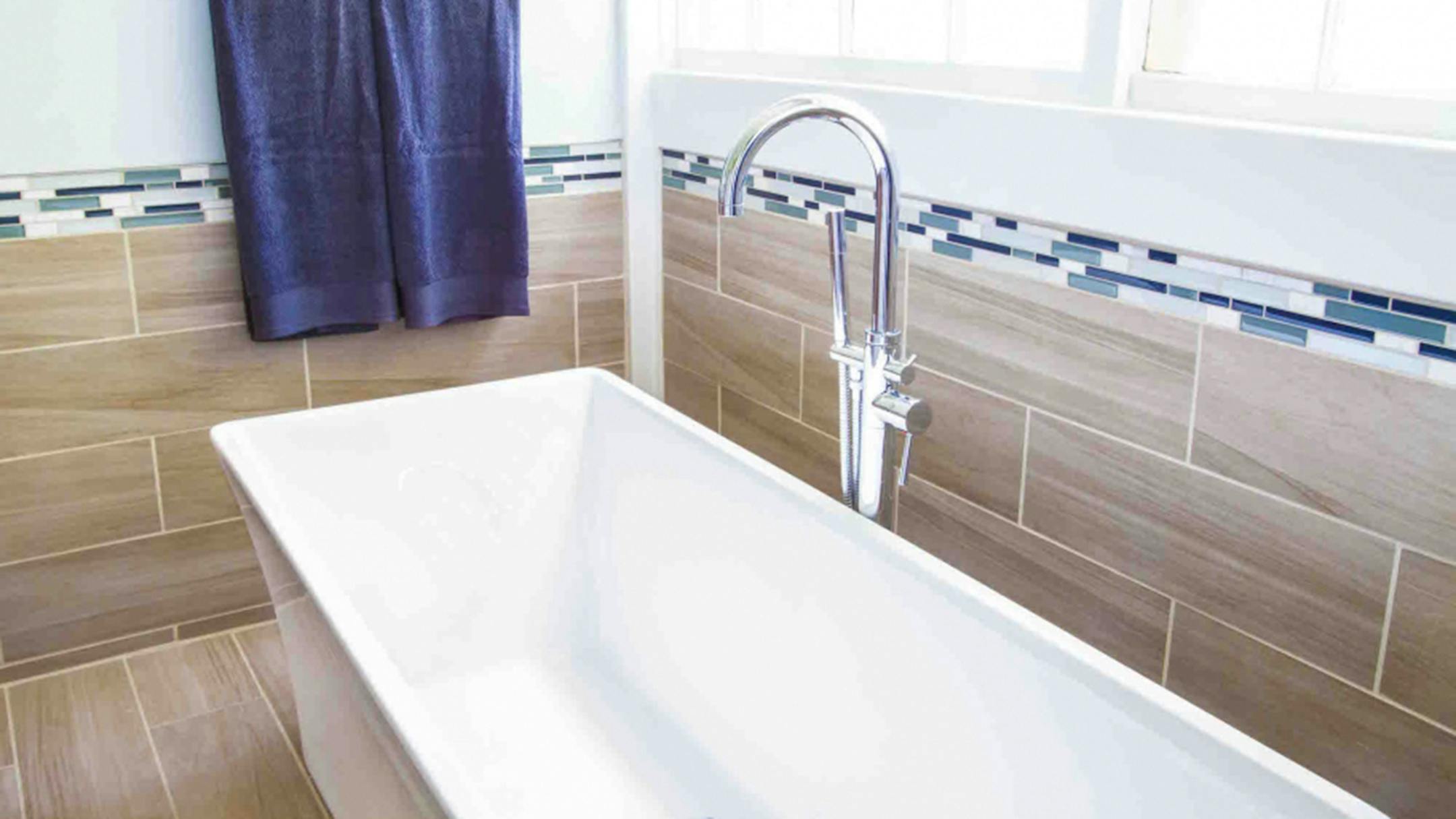 Katelin Kinney/Angie's List
Using faux wood tile on bathroom and shower walls is a growing trend.