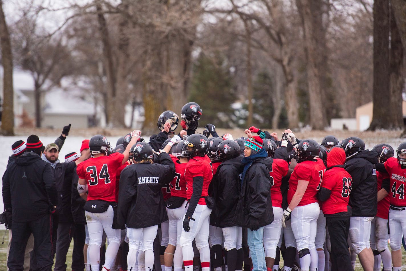 Martin Luther players celebrated after defeating Crown College on Saturday.