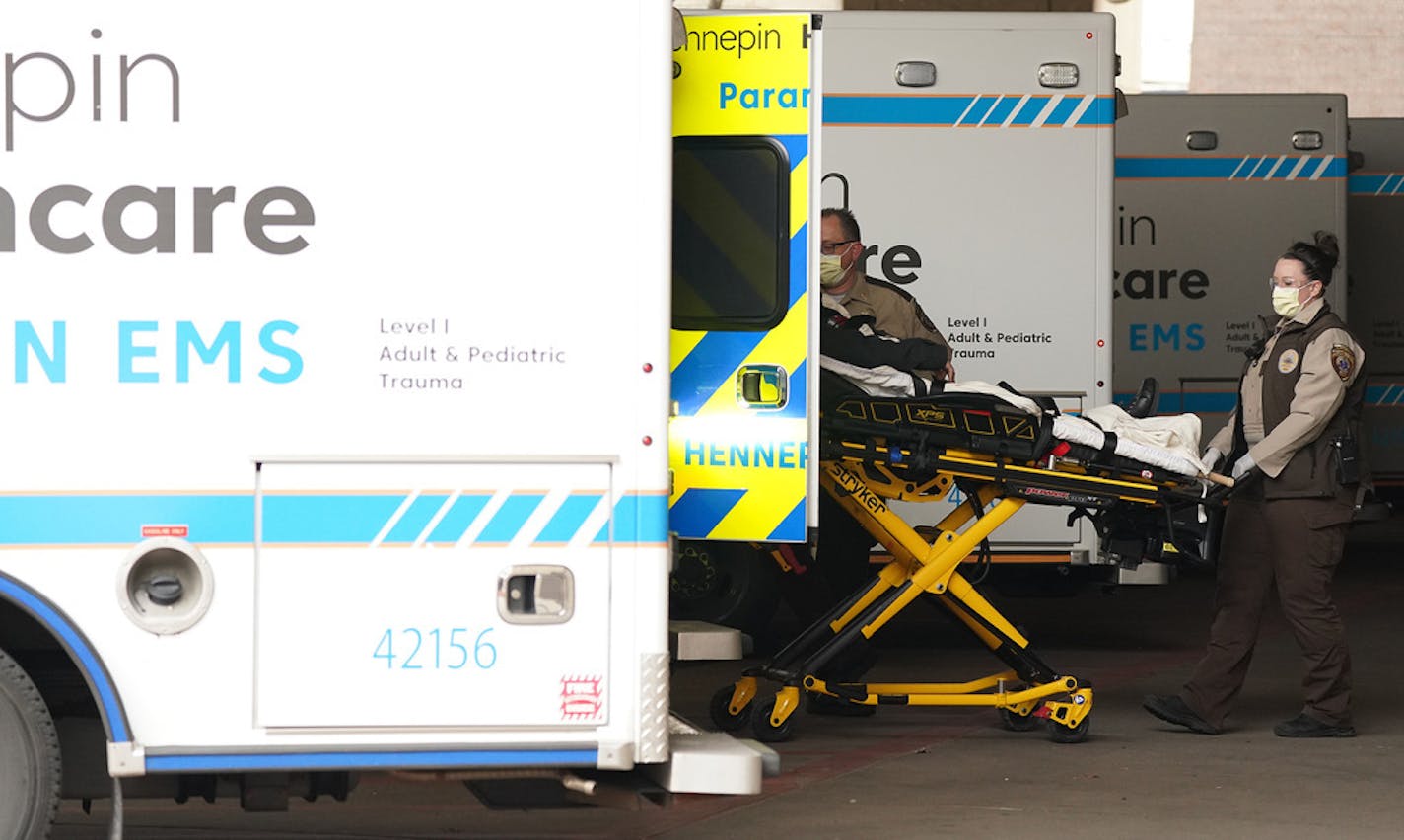 Ambulances came and went at Hennepin County Medical Center Thursday. ] ANTHONY SOUFFLE &#x2022; anthony.souffle@startribune.com Ambulances came and went at Hennepin County Medical Center Thursday, April 2, 2020 in Minneapolis.