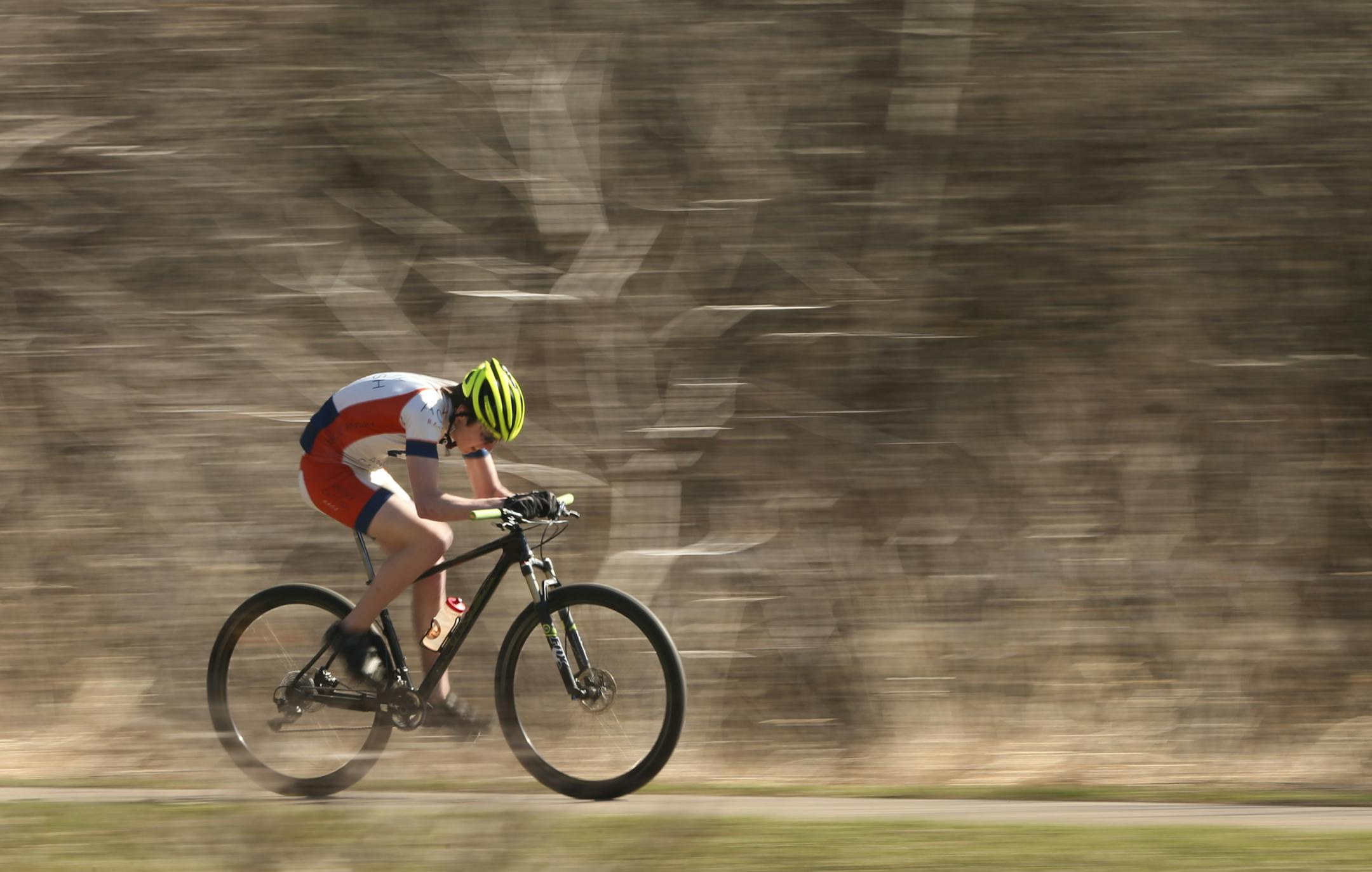 Max Ellingson on his mountain bike, far from any mountains on a paved trail in Edina's Bredesen Park Thursday afternoon. ] JEFF WHEELER ‚Ä¢ jeff.wheeler@startribune.com Max Ellingson's passion for mountain biking isn't limited by his cerebral palsy. The Edina High School junior compete's on his school's mountain bike team and rides competitively all summer as well. Thursday afternoon, April 10, 2014 he did some intervals at Bredesen Park in Edina so he could be photographed in t