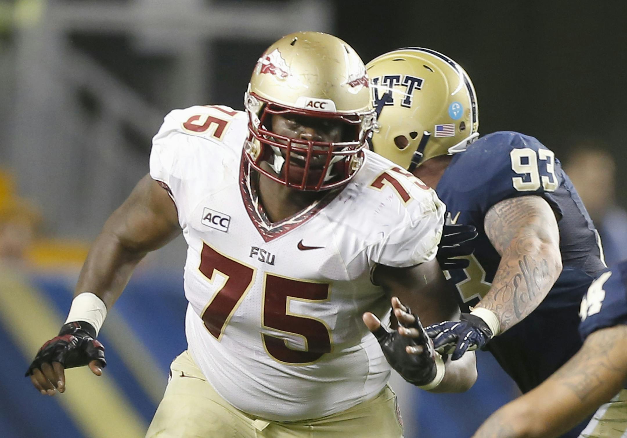 Florida State offensive linesman Cameron Erving (75) plays in an NCAA football game between Florida State and Pittsburgh on Monday, Sept. 2, 2013 in Pittsburgh. (AP Photo/Keith Srakocic) ORG XMIT: OTK