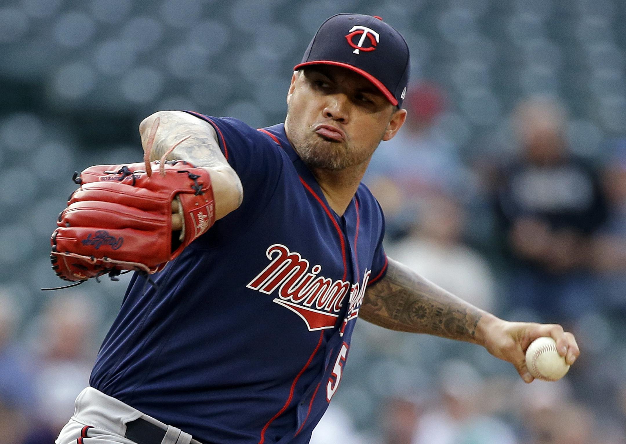 Minnesota Twins starting pitcher Hector Santiago throws against the Seattle Mariners in the first inning of a baseball game Tuesday, June 6, 2017, in Seattle. (AP Photo/Elaine Thompson)