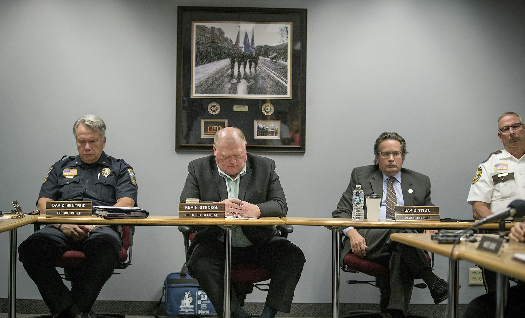 Waite Park Police Chief Dave Bentrud, left, Elected Official Kevin Stenson, center, Peace Officer David Titus, and Nobles County Sheriff Kent Wilkening, right, listened to Valerie Castile, mother of Philando Castile, spoke passionately before the Board of Peace Officer Standards and Training (POST), during a vote from a request from Gov. Mark Dayton that a new law enforcement training fund approved by the Legislature this year be named for Philando Castile, Thursday, July 27, 2017 in St. Paul, M