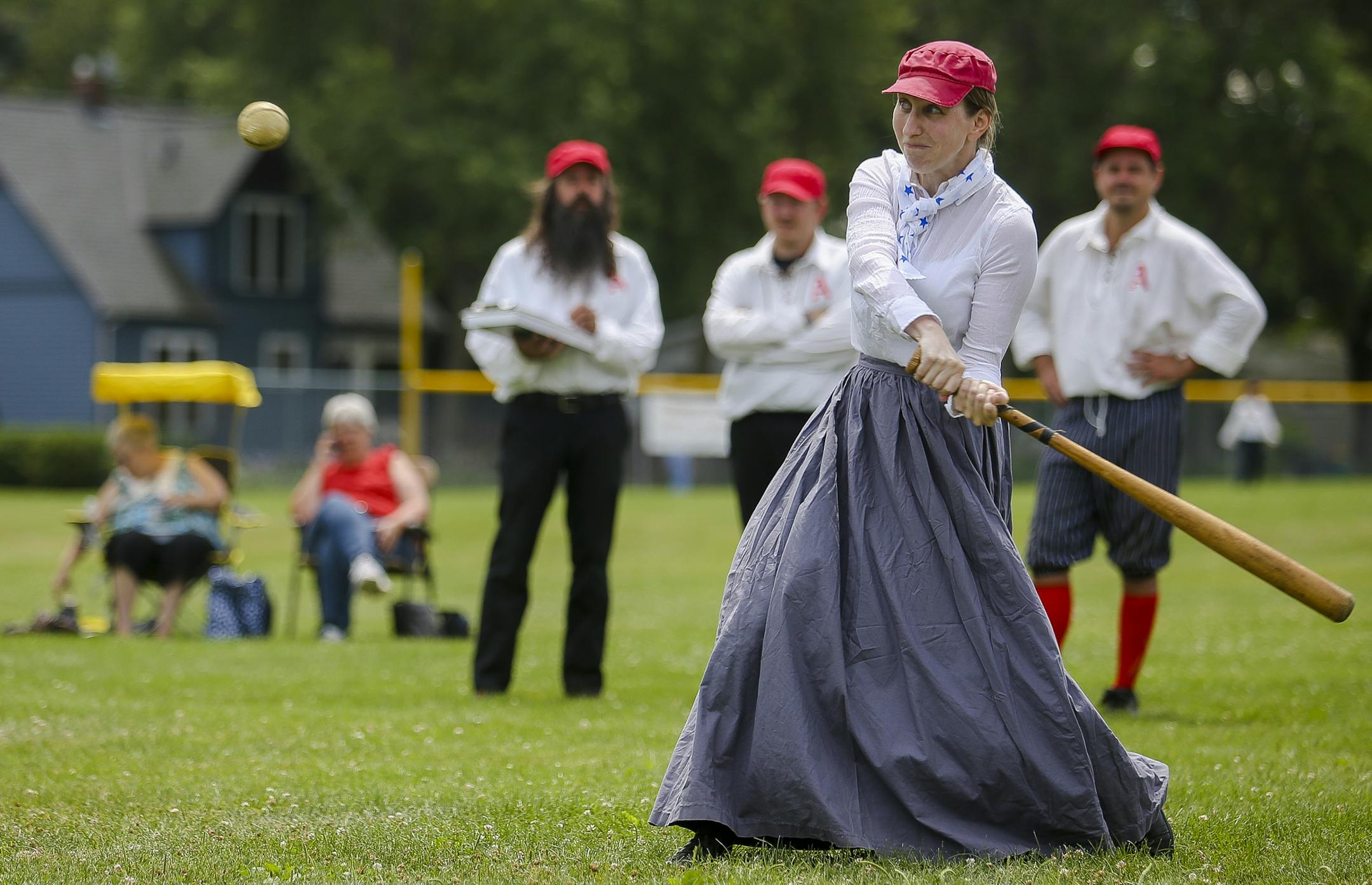 Lady Quicksteps captain Rosie Dotson lines herself up to make connection on the ball. ] Timothy Nwachukwu • timothy.nwachukwu@startribune.com Vintage base ball teams take players and spectators back to 1860-rules of play at Old Athletic Field on Saturday, July 16, 2016 in Stillwater, Minn. The vintage exhibition games are part of Lumberjack Days, a three day celebration of the people and history of the "birthplace of Minnesota."
