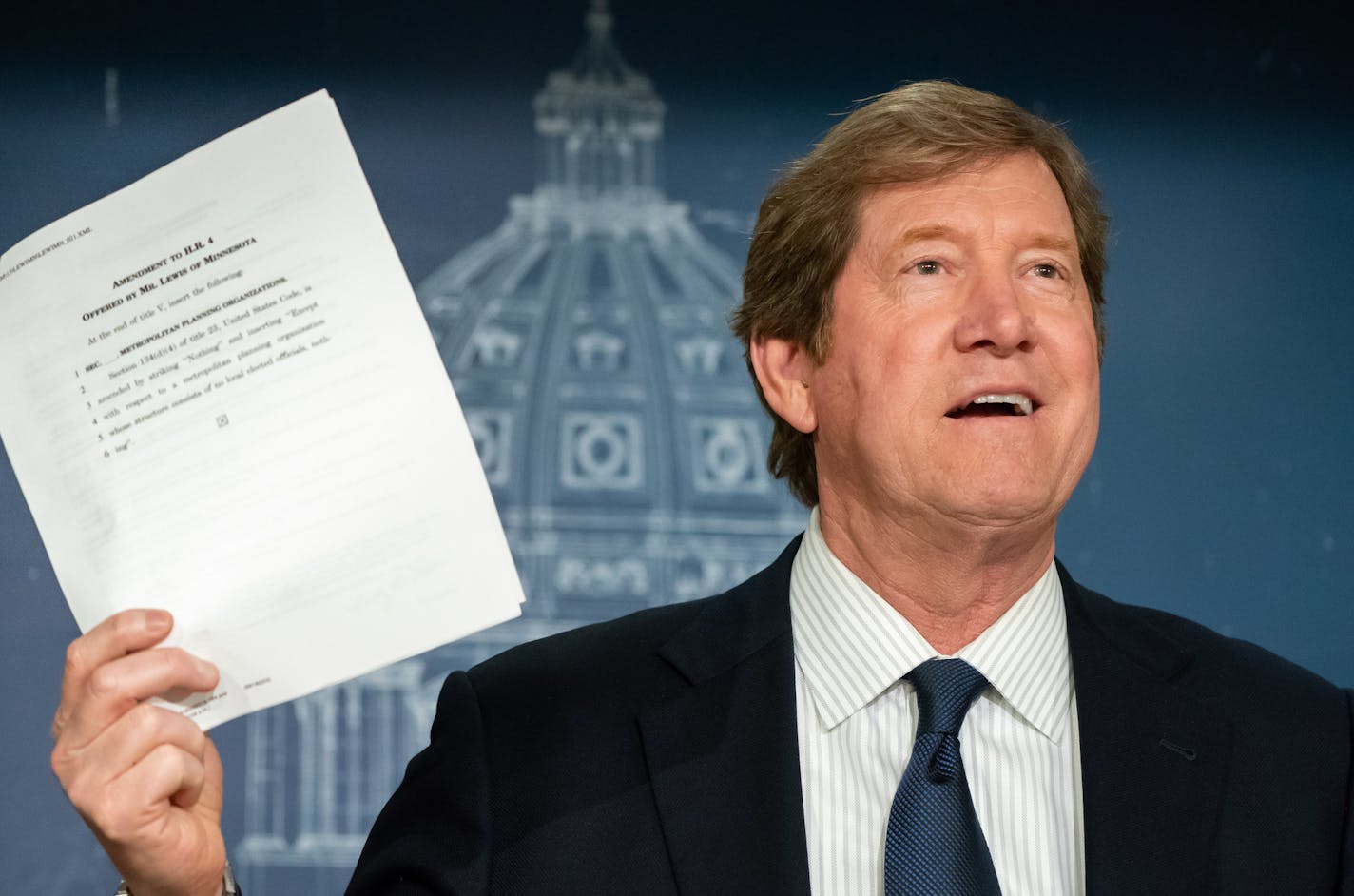 U.S. Rep. Jason Lewis held a copy of his amendment to rein in the Met Council. ] GLEN STUBBE &#xef; glen.stubbe@startribune.com Wednesday, May 2, 2018 Rep. Jason Lewis and state lawmakers are trumpeting their efforts to rein in the Metropolitan Council at the State Capitol today. Gov. Mark Dayton has sent another letter to Capitol Hill leaders, asking that the Senate not approve Lewis' measure to strip the council of its most important transportation authority.