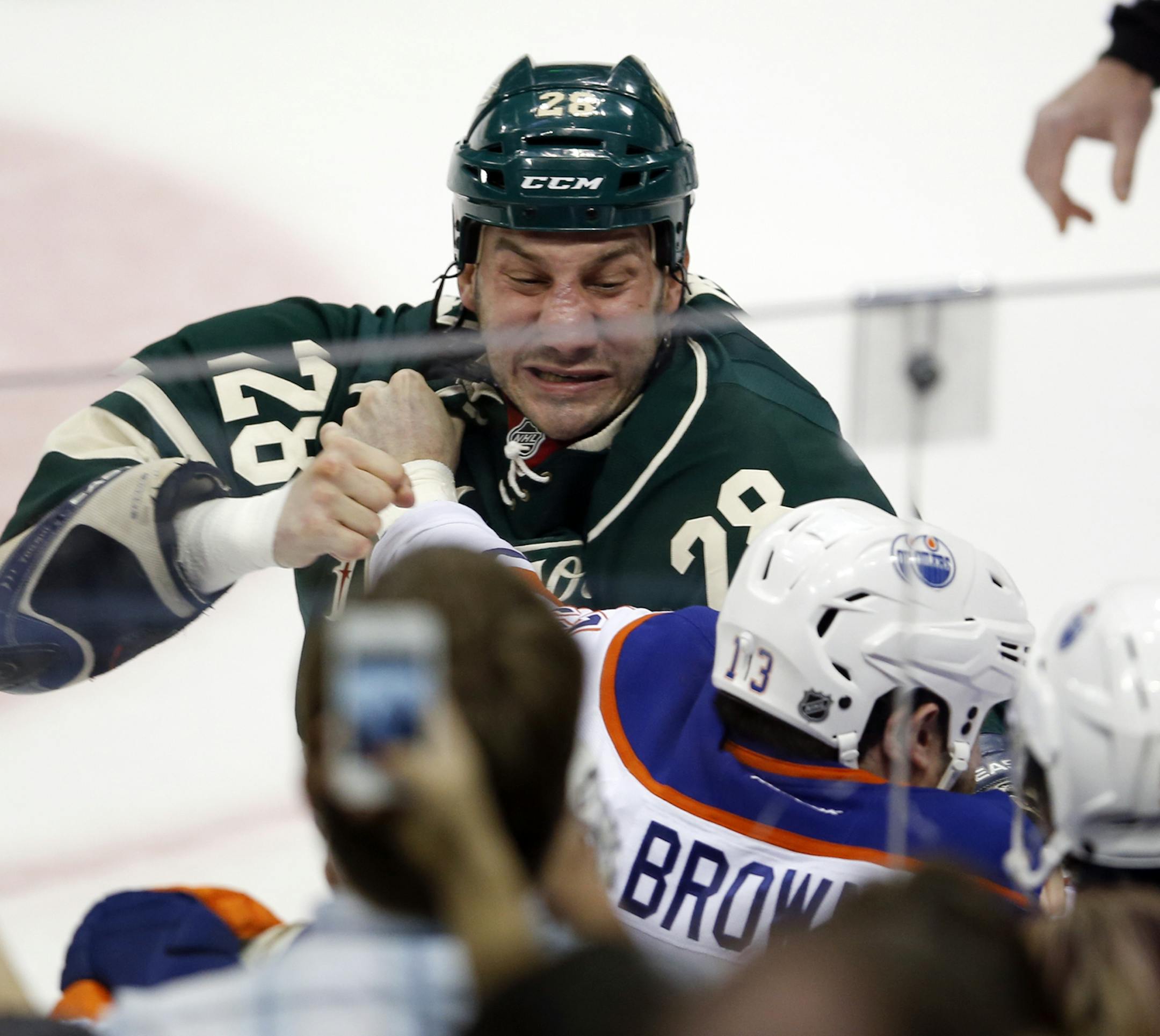 The game began with a fight in the opening seconds between the Edmonton Oilers Mike Brown (13) and the Minnesota Wild's Zenon Konopka (28) during first period action Friday, April 26, 2013, at the Xcel Energy Center in St. Paul, MN.](DAVID JOLES/STARTRIBUNE) djoles@startribune.com Edmonton Oilers at the Minnesota Wild Friday, April 26, 2013, at the Xcel Energy Center in St. Paul, MN.