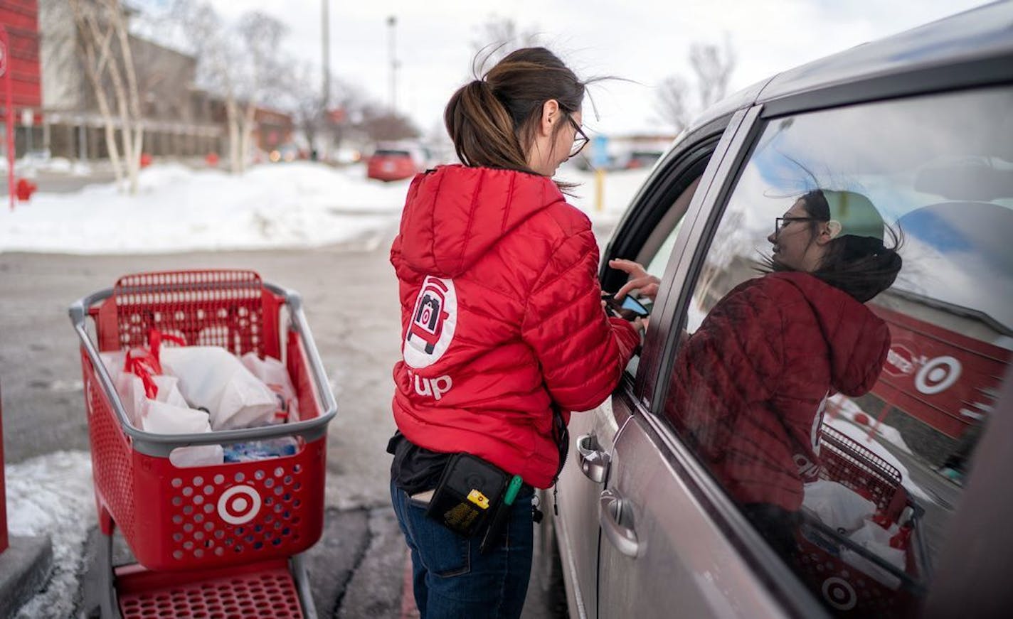 Tara Corrigan brought an order from the Apple Valley Target store to the drive-up outside the store in March.