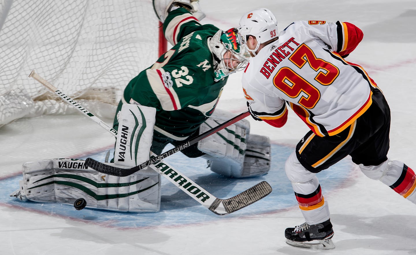 Alex Stalock (32) blocked a shot by Sam Bennett (93) during the overtime shootout.