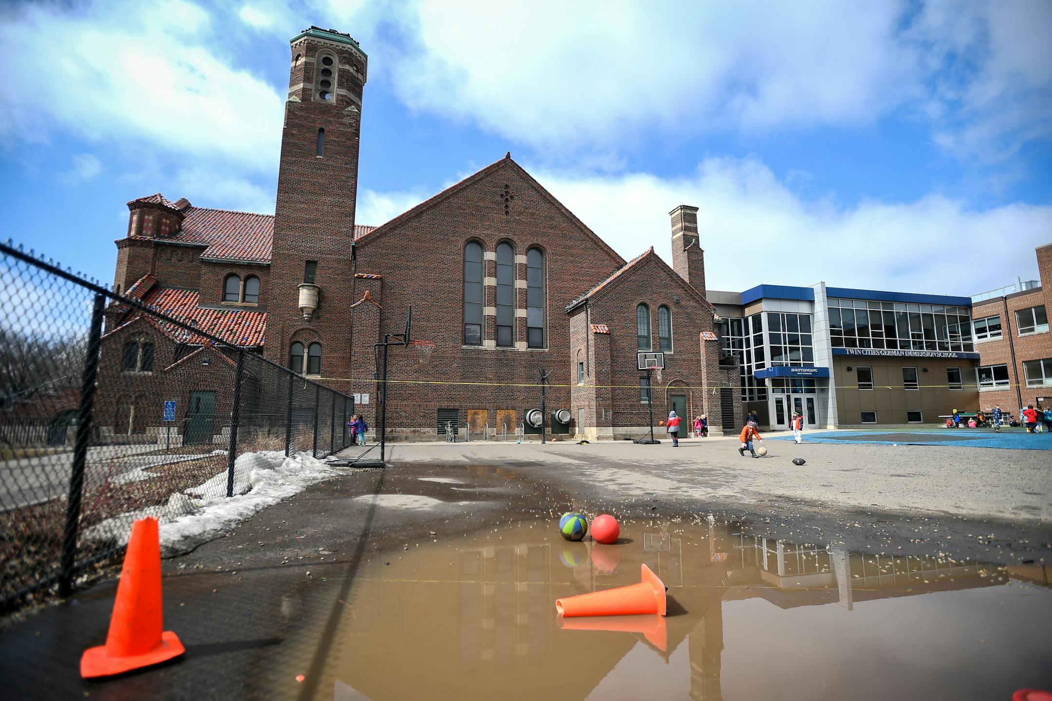 The Twin Cities German Immersion School and adjoining former Catholic church. ] AARON LAVINSKY ï aaron.lavinsky@startribune.com Neighborhood angst is brewing in Como Park, as the Twin Cities German Immersion School considers tearing down a former Catholic church it owns and has used as a gym and cafeteria to make room for expansion. Neighbors are not happy and want the school to find a way to preserve the former St. Andrew's Catholic Church, built in 1927. We photograph the church on Tuesda