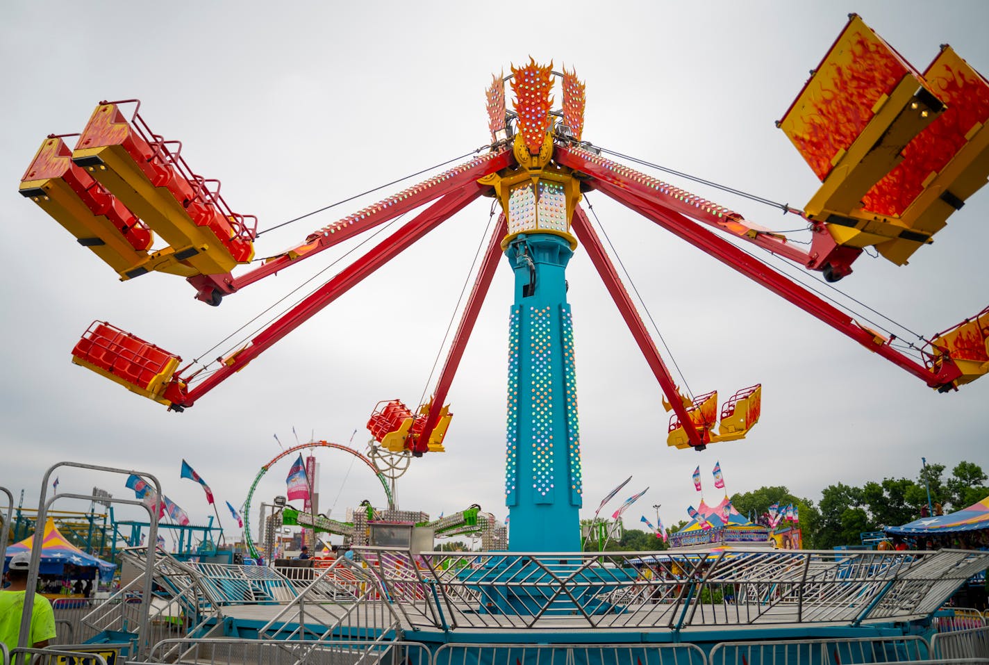 Fair employees test run one of the rides while setting up shop at the Minnesota State Fairgrounds' Midway Parkway. The fair opens to the public on Thursday, Aug. 24 and will run through Sept. 4.