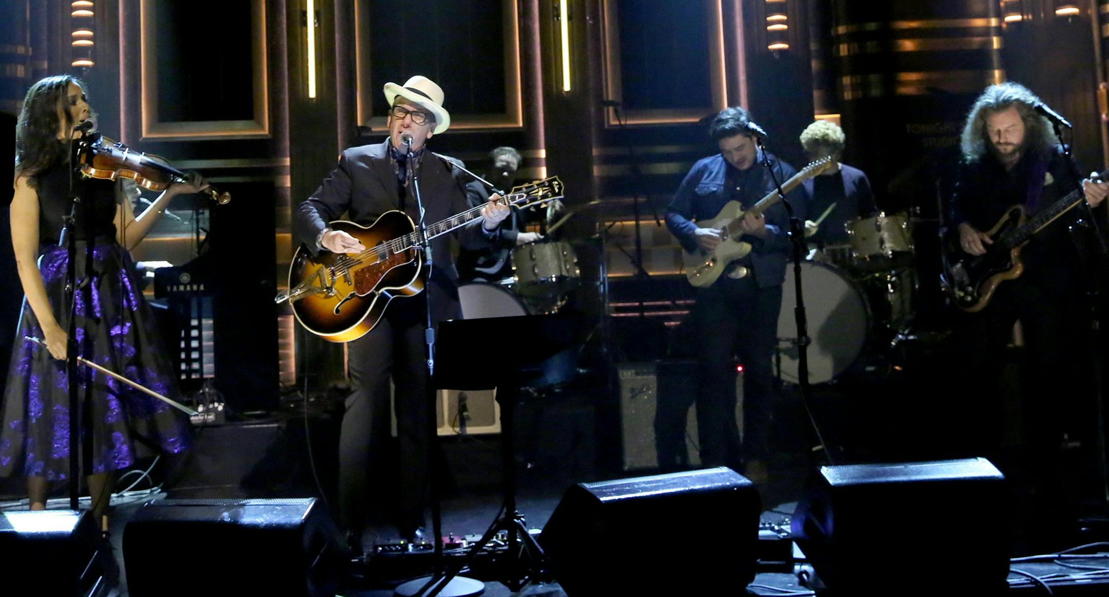 THE TONIGHT SHOW STARRING JIMMY FALLON -- Episode 0159 -- Pictured: (l-r) Rhiannon Giddens, Elvis Costello, Marcus Mumford and Jim James of musical guest The New Basement Tapes perform on November 10, 2014 -- (Photo by: Douglas Gorenstein/NBC) ORG XMIT: Season: 1