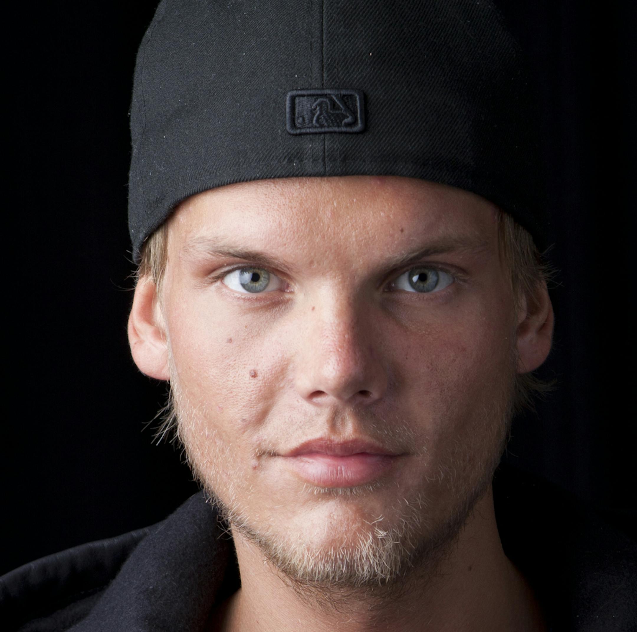 FILE - In this Aug. 30, 2013 file photo, Swedish DJ-producer, Avicii poses for a portrait in New York. Swedish-born Avicii, whose name is Tim Bergling, was found dead, Friday April 20, 2018, in Muscat, Oman. He was 28. (Photo by Amy Sussman/Invision/AP, File)