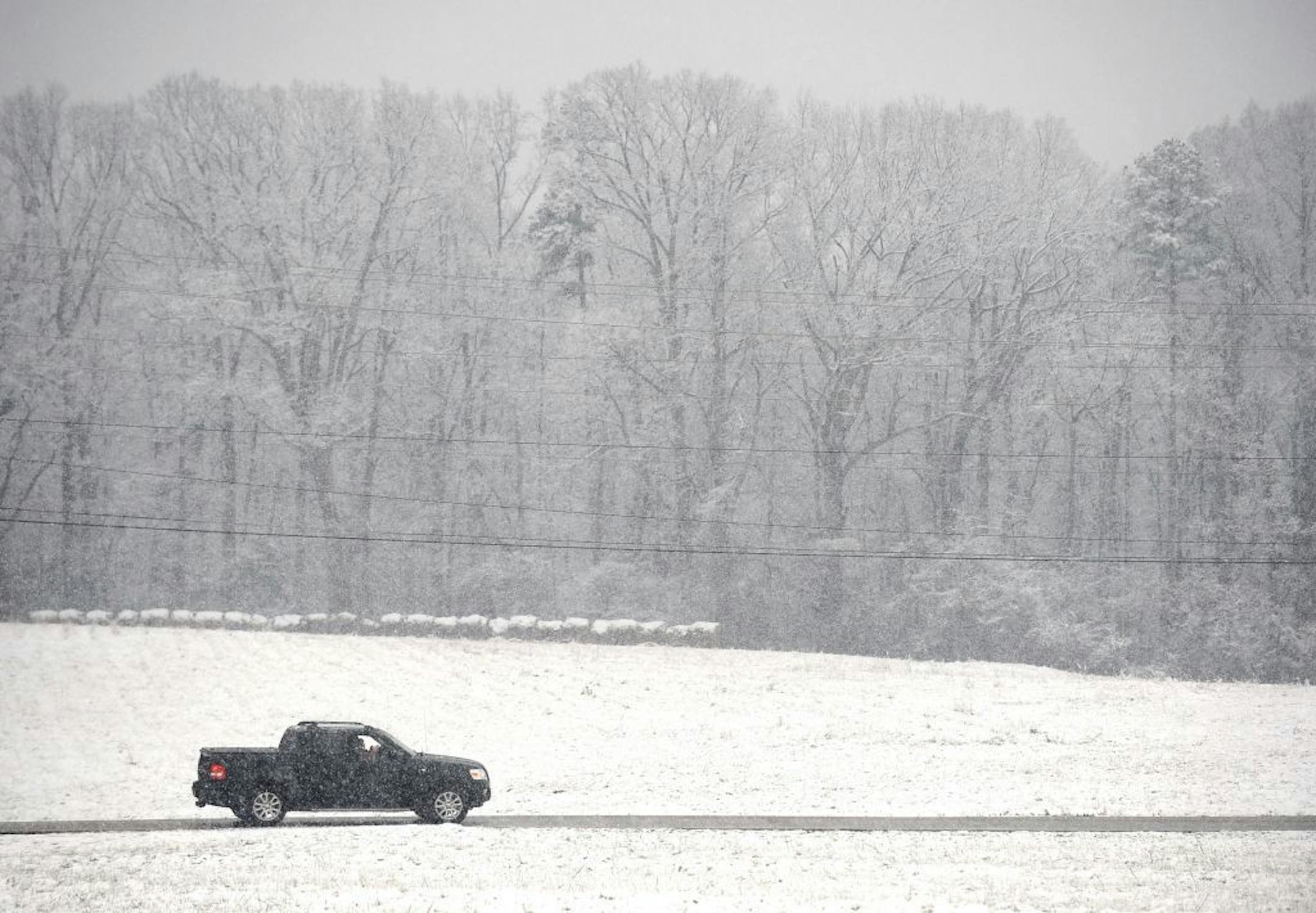 A car travels on Blacks Dr. on Tuesday, Feb. 11, 2014, in Greenville, S.C.