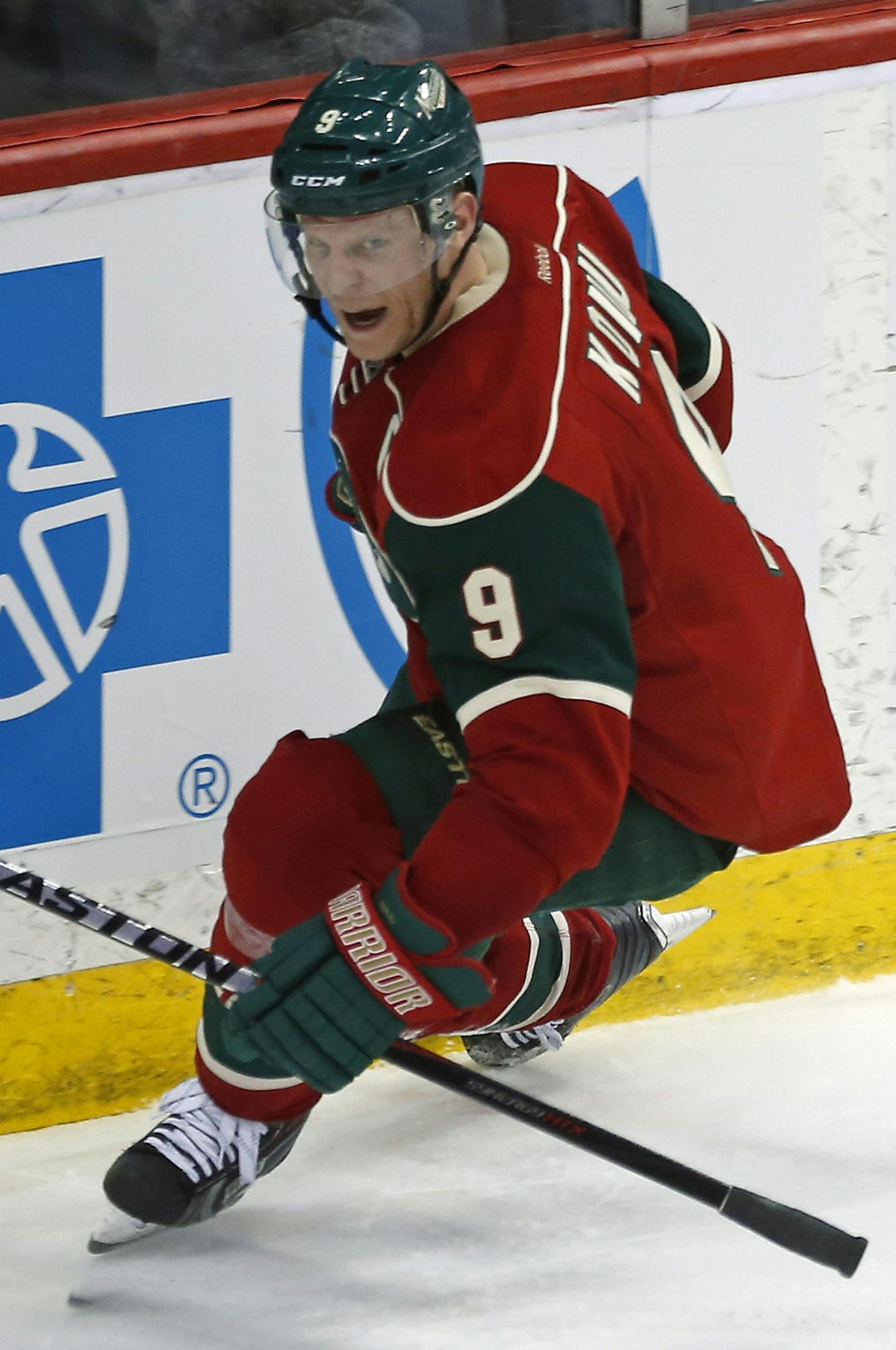 Minnesota Wild&#xed;s Mikko Koivu, of Finland, celebrates his game-winning goal against Calgary Flames goalie Karri Ramo, of Finland, in the third period of an NHL hockey game, Friday, March 27, 2015, in St. Paul, Minn. The Wild won 4-2. (AP Photo/Jim Mone) ORG XMIT: MNJM107