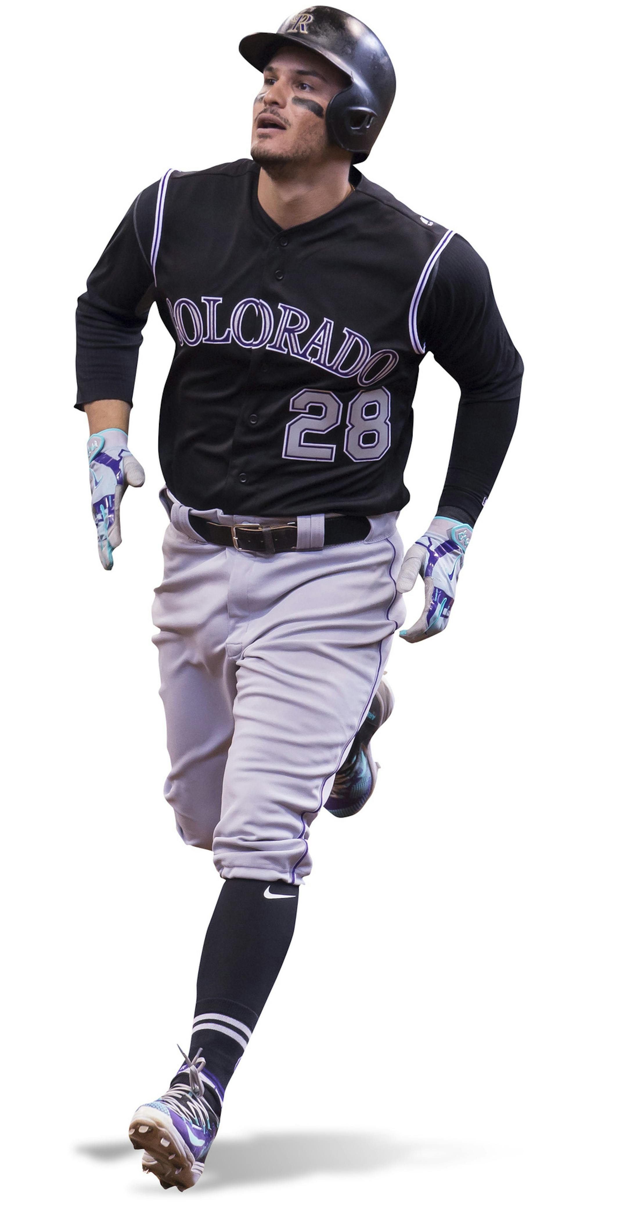 April 06, 2017: Colorado Rockies third baseman Nolan Arenado #28 hits a solo home run in 9th inning of the Major League Baseball game between the Milwaukee Brewers and the Colorado Rockies at Miller Park in Milwaukee, WI. Rockies defeated the Brewers 2-1. John Fisher/CSM (Cal Sport Media via AP Images) ORG XMIT: CSMAP