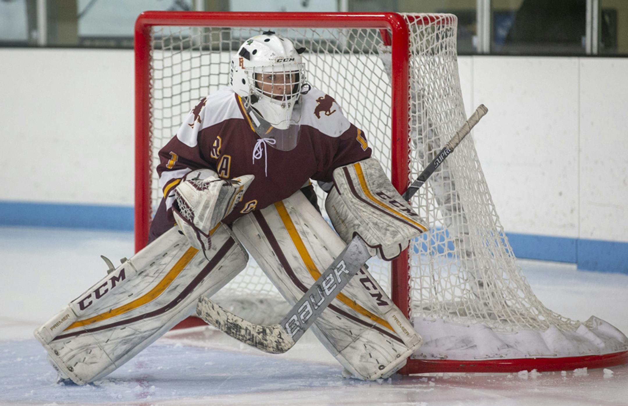 Forest Lake's Allyn Goehner watches the play in the corner against East Ridge. Goehner had 19 saves in the Rangers' 3-1 victory over the Raptors. Photo by Jeff Lawler, SportsEngine