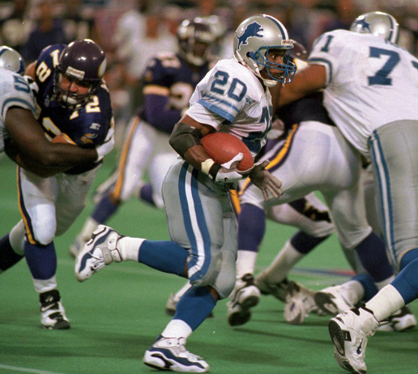 Detroit Lions running back Barry Sanders runs for short yardage during the fourth quarter against the Minnesota Vikings on Sunday, Sept. 1, 1996, in Minneapolis. The Vikings went on to beat the Lions 17-13.(AP Photo/Tom Olmscheid) ORG XMIT: MP102